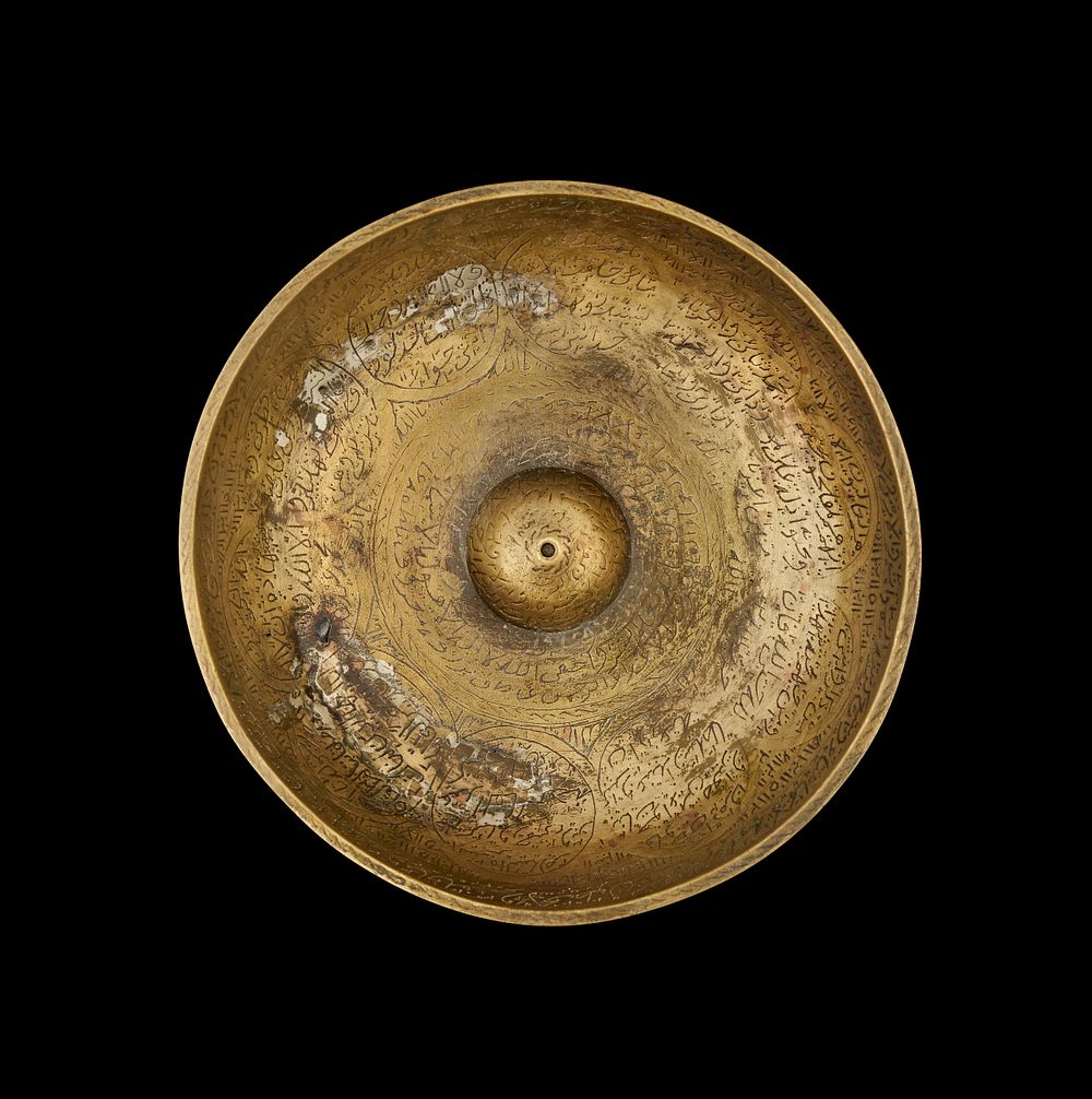 Lot 283: AN ENGRAVED MAMLUK BRASS MAGIC BOWL, EGYPT OR SYRIA, 15TH-16TH CENTURY