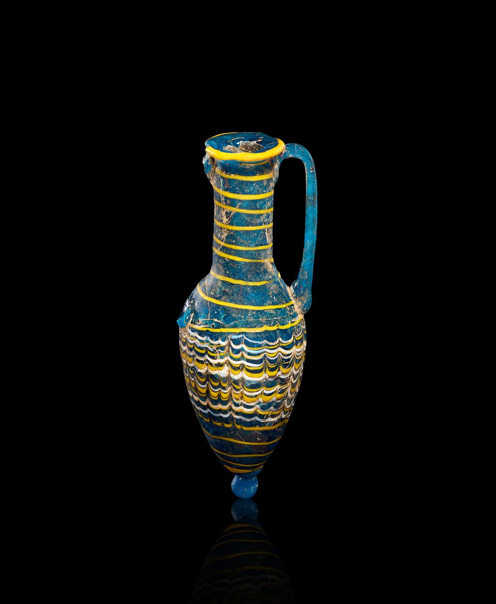 Lot 335: A CORE-FORMED GLASS OINOCHOE, GREEK, EASTERN MEDITERRANEAN, 2ND–1ST CENTURY BCE OR LATER