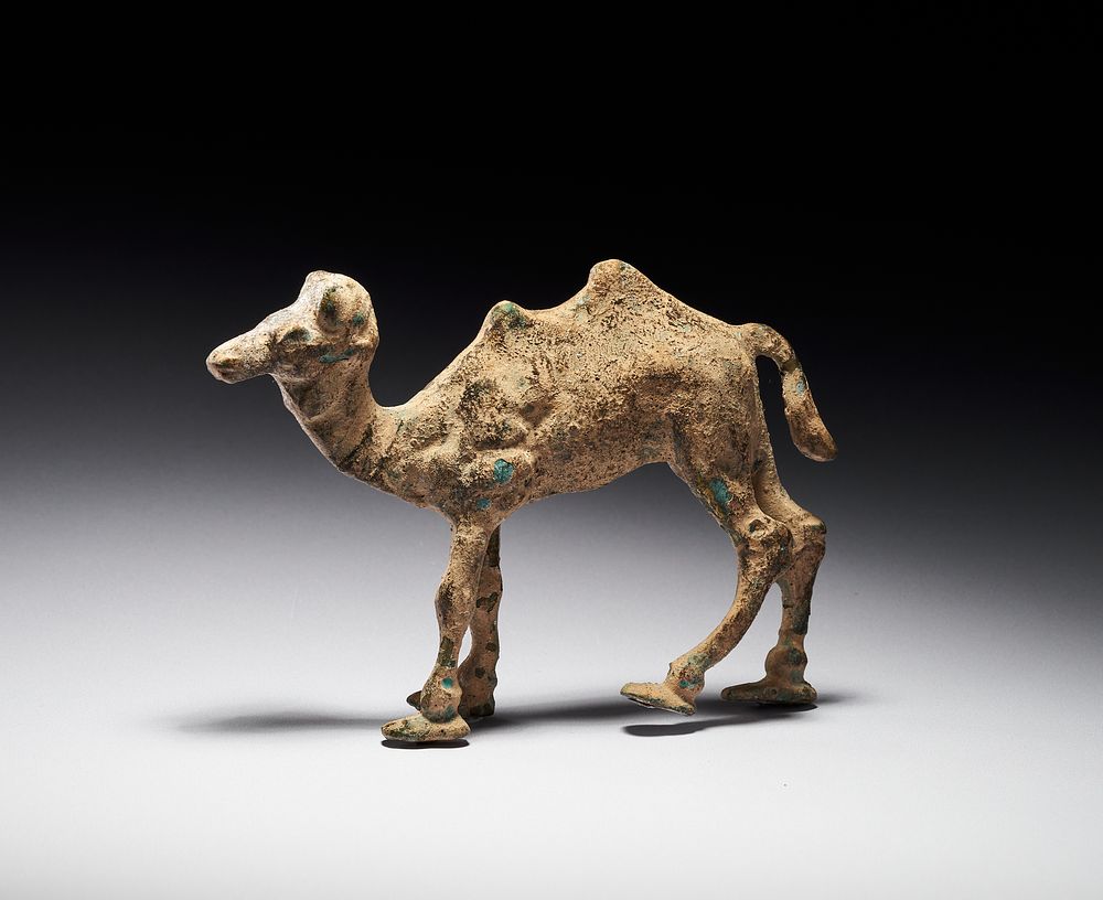 Lot 183: AN ANCIENT BACTRIAN BRONZE FIGURINE OF A CAMEL, PROBABLY 3RD–2ND MILLENNIUM BCE