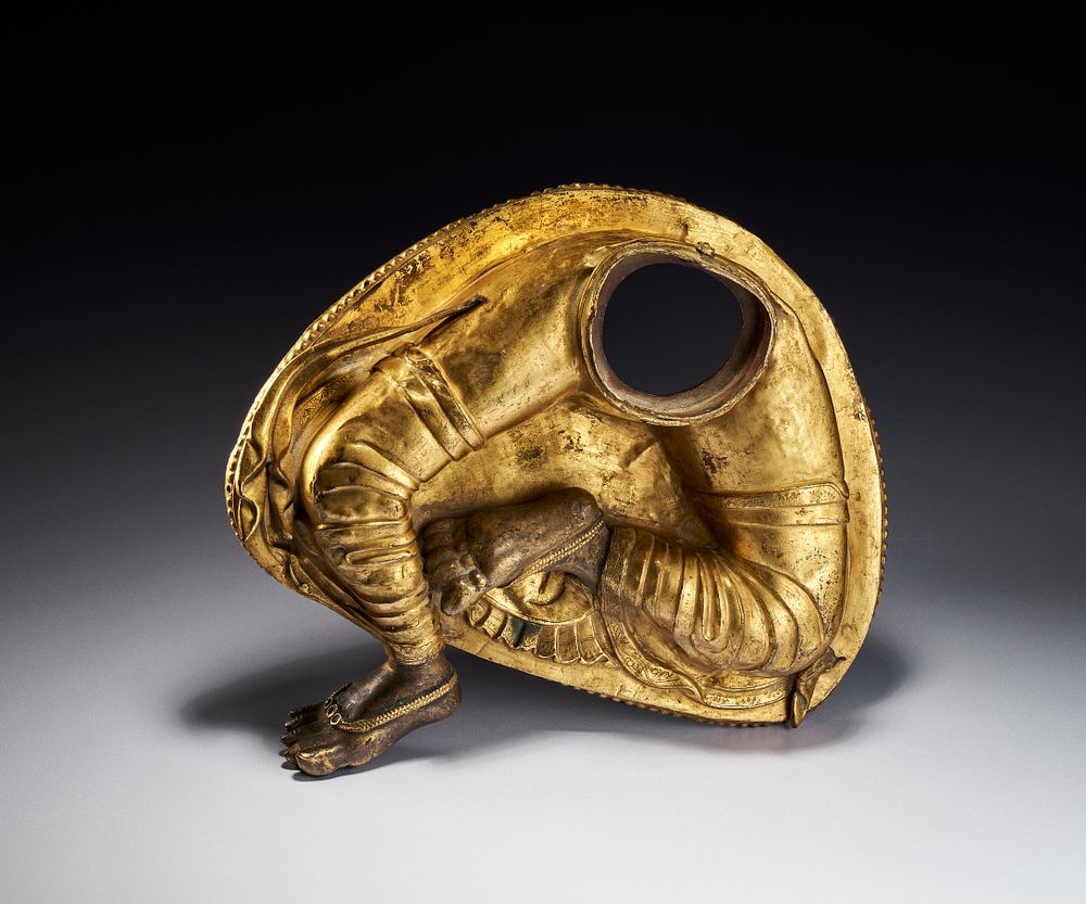 Lot 243: A HIMALAYAN FRAGMENTARY GILT BRONZE FIGURE OF A DEITY, TIBET OR NEPAL, 18TH CENTURY