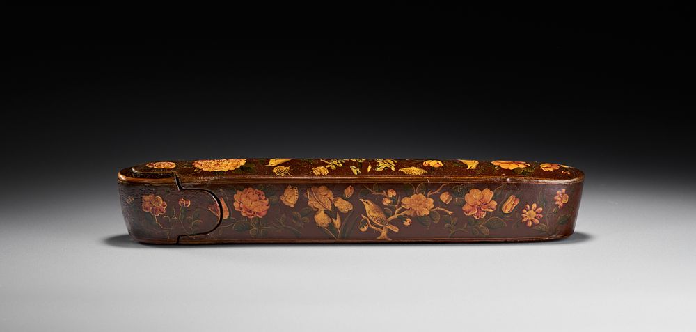 Lot 153: A PERSIAN QAJAR LACQUERED PAPIER-MACHE PEN BOX QALAMDAN, 19TH CENTURY