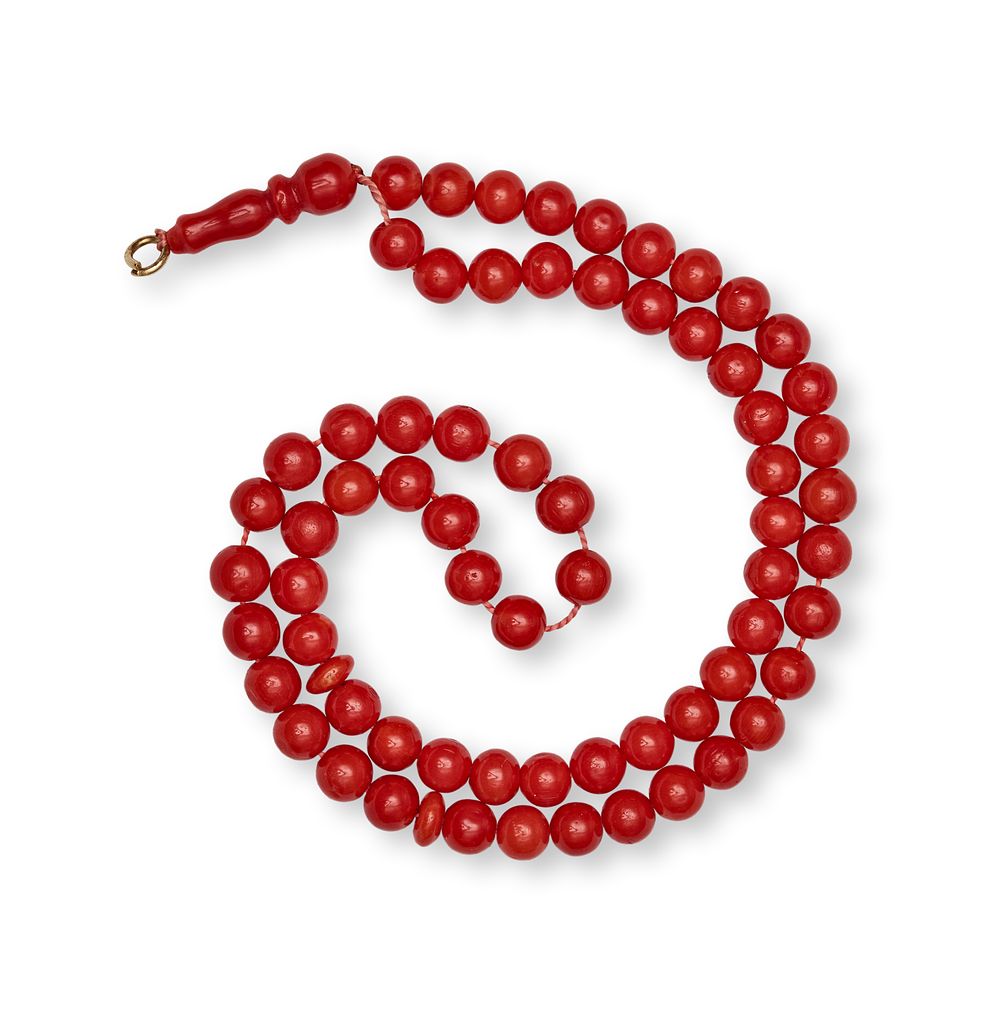 Lot 171: A RED CORAL BEADED PRAYER STRAND (TASBIH)