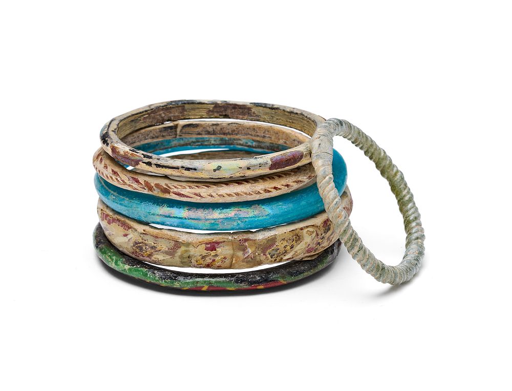 Lot 175: A GROUP OF EARLY ISLAMIC MOSAIC GLASS BANGLES, 7TH-9TH CENTURY