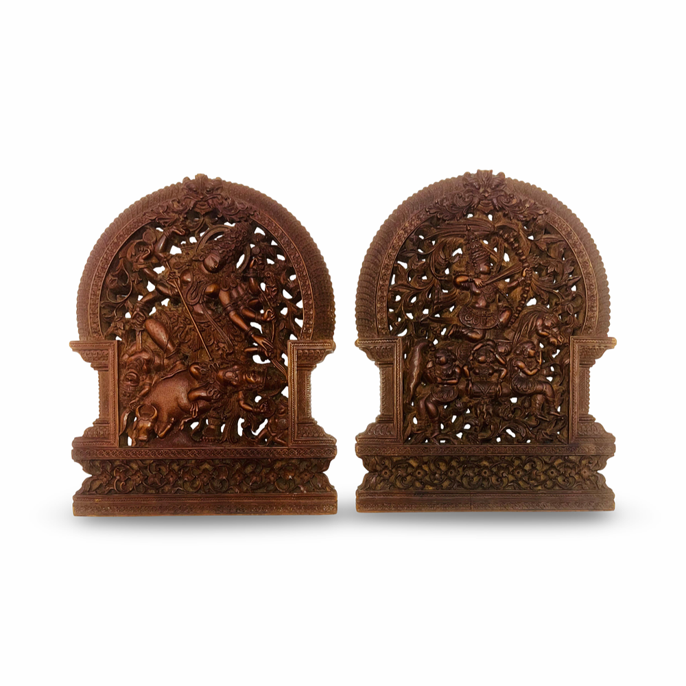 Lot 217: A PAIR OF SOUTH INDIAN CARVED WOOD PANELS DEPICTING MAHISHASURAMARDINI AND A HEROIC FIGURE ON HORSEBACK