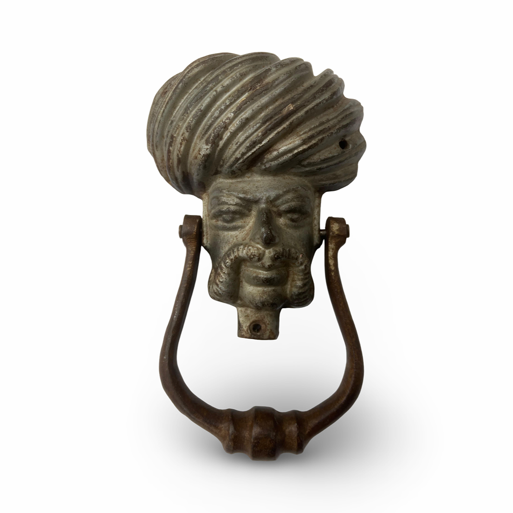 Lot 221: AN ORIENTALIST OTTOMAN BRONZE DOOR KNOCKER WITH TURBANED MALE BUST, 19TH CENTURY