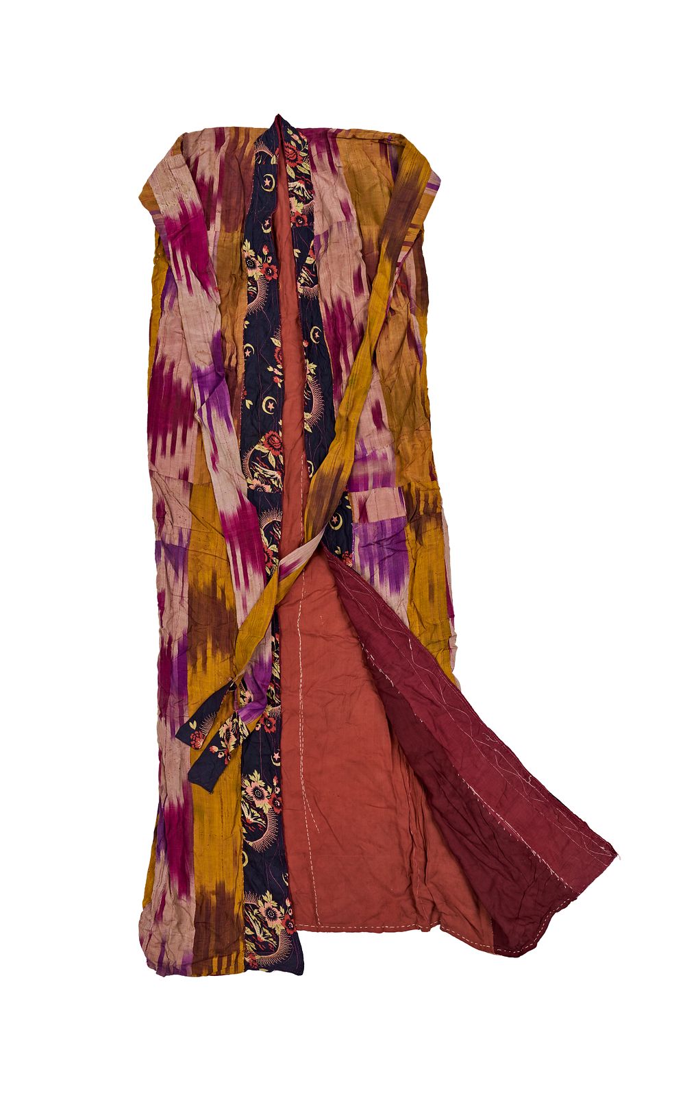 Lot 281: A CENTRAL ASIAN SILK AND COTTON IKAT WOMAN'S CHAPAN, CIRCA 1880S
