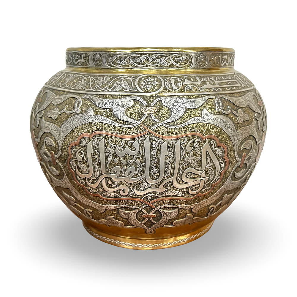 Lot 225: A MAMLUK REVIVAL SILVER AND COPPER INLAID BRASS BOWL, SYRIA, 19TH CENTURY