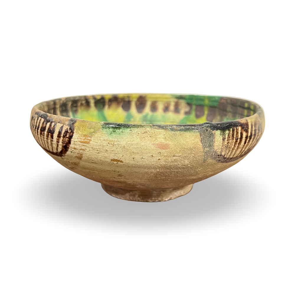 Lot 167: A SGRAFFITO SPLASHWARE POTTERY BOWL, PERSIA, NISHAPUR, 10TH CENTURY