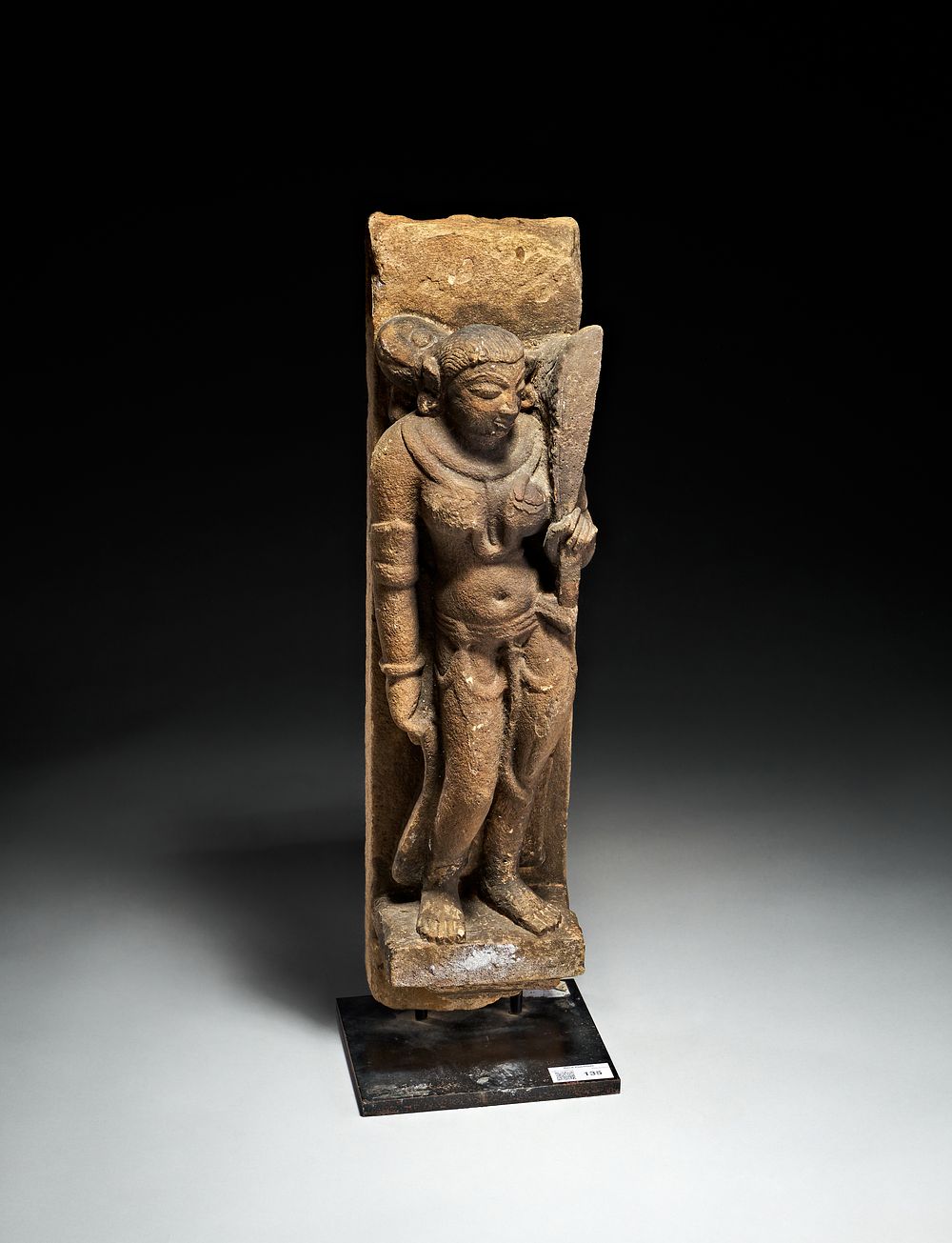 Lot 267: AN INDIAN STONE FIGURE OF A SURASUNDARI, CENTRAL INDIA, CIRCA 10TH CENTURY