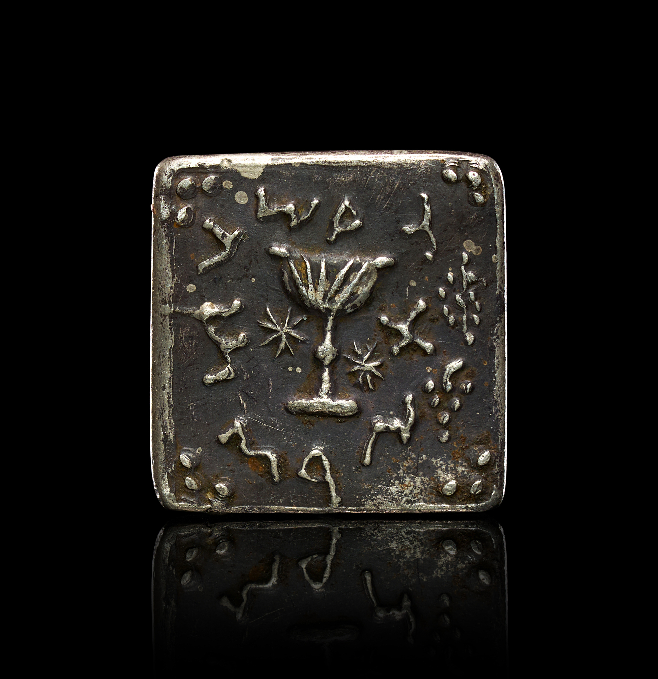 A POST-MEDIEVAL SILVER-TONED SQUARE SEAL MATRIX OR WEIGHT IN THE STYLE OF A JUDEAN FIRST REVOLT SHEKEL, 18TH-19TH CENTURY