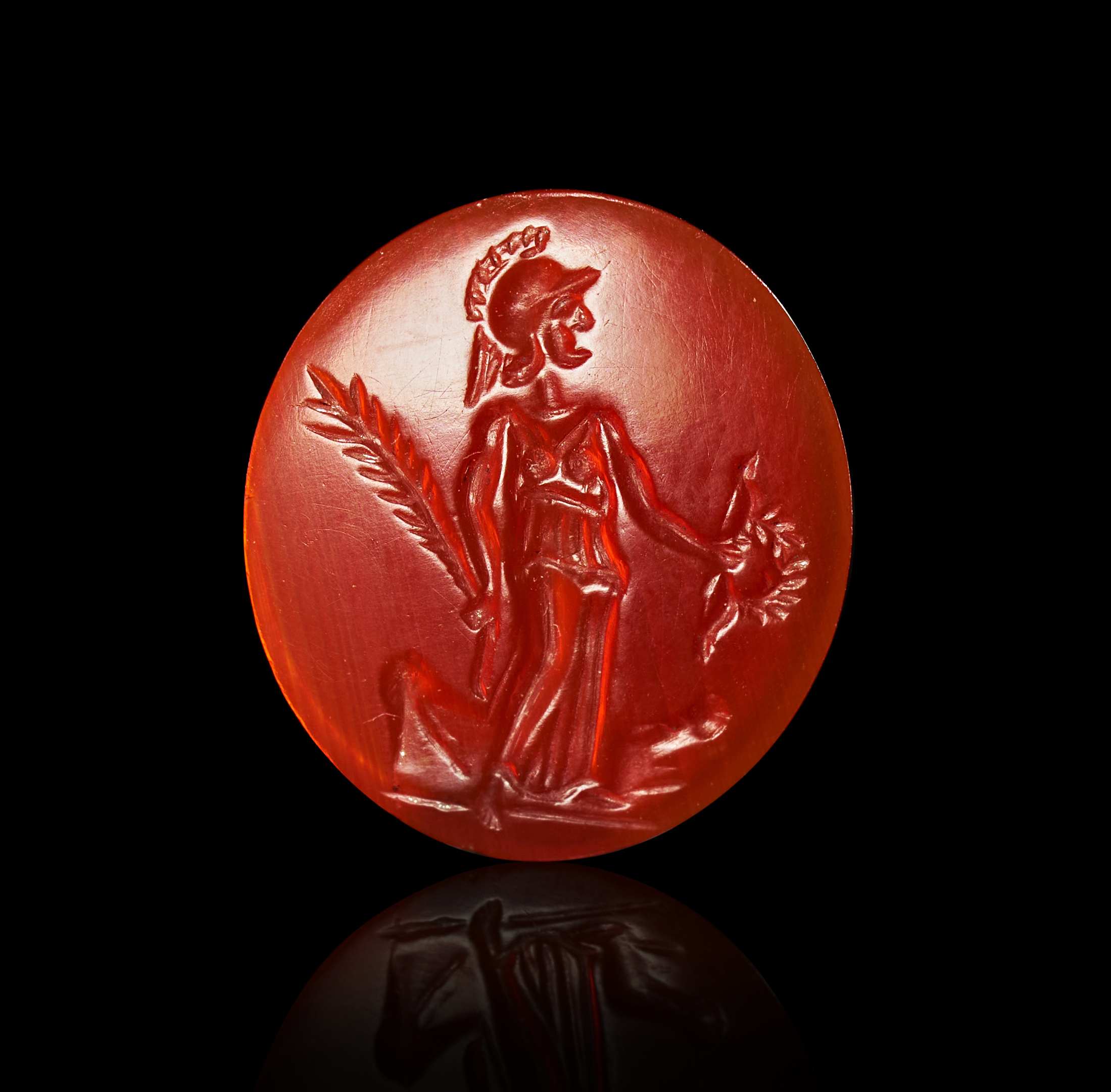 A CARNELIAN INTAGLIO DEPICTING MINERVA (ATHENA), 1ST - 2ND CENTURY A.D