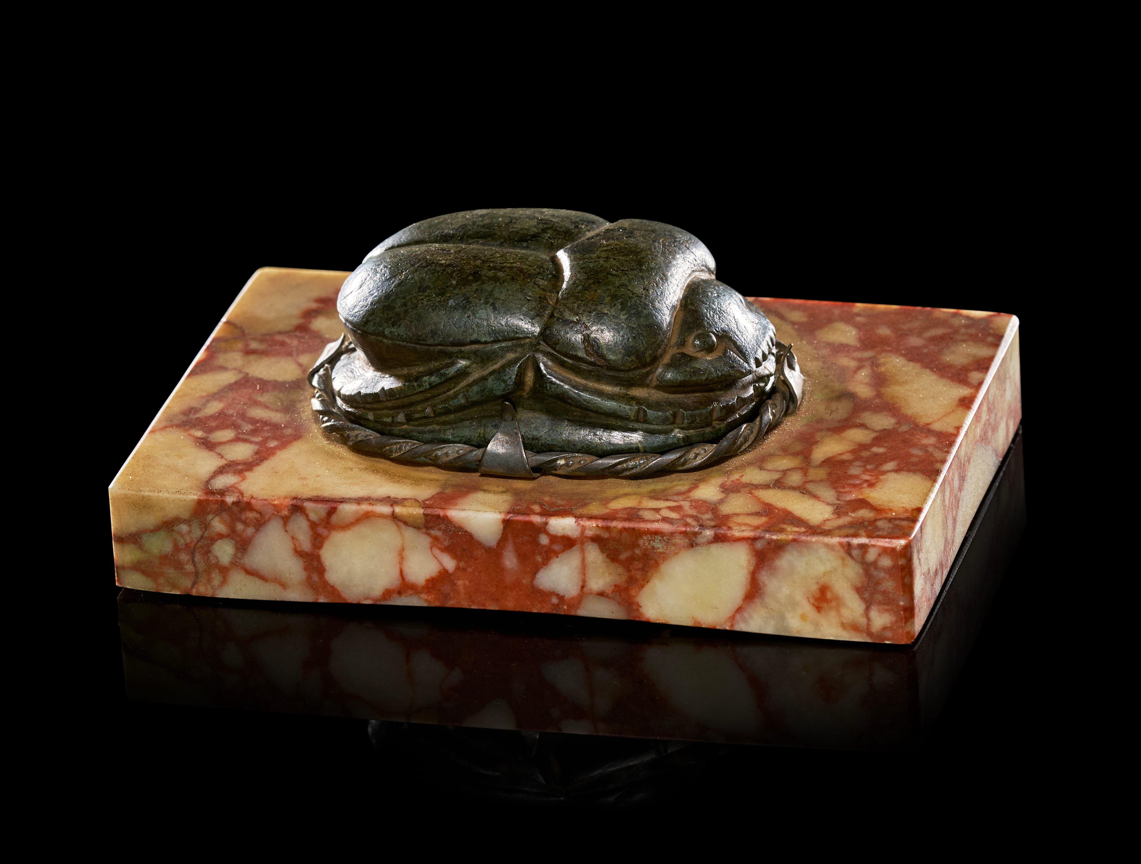 A LARGE EGYPTIAN STONE HEART SCARAB WITH THE PRENOMEN OF THUTMOSE III, NEW KINGDOM, CIRCA 1479–1425 B.C.