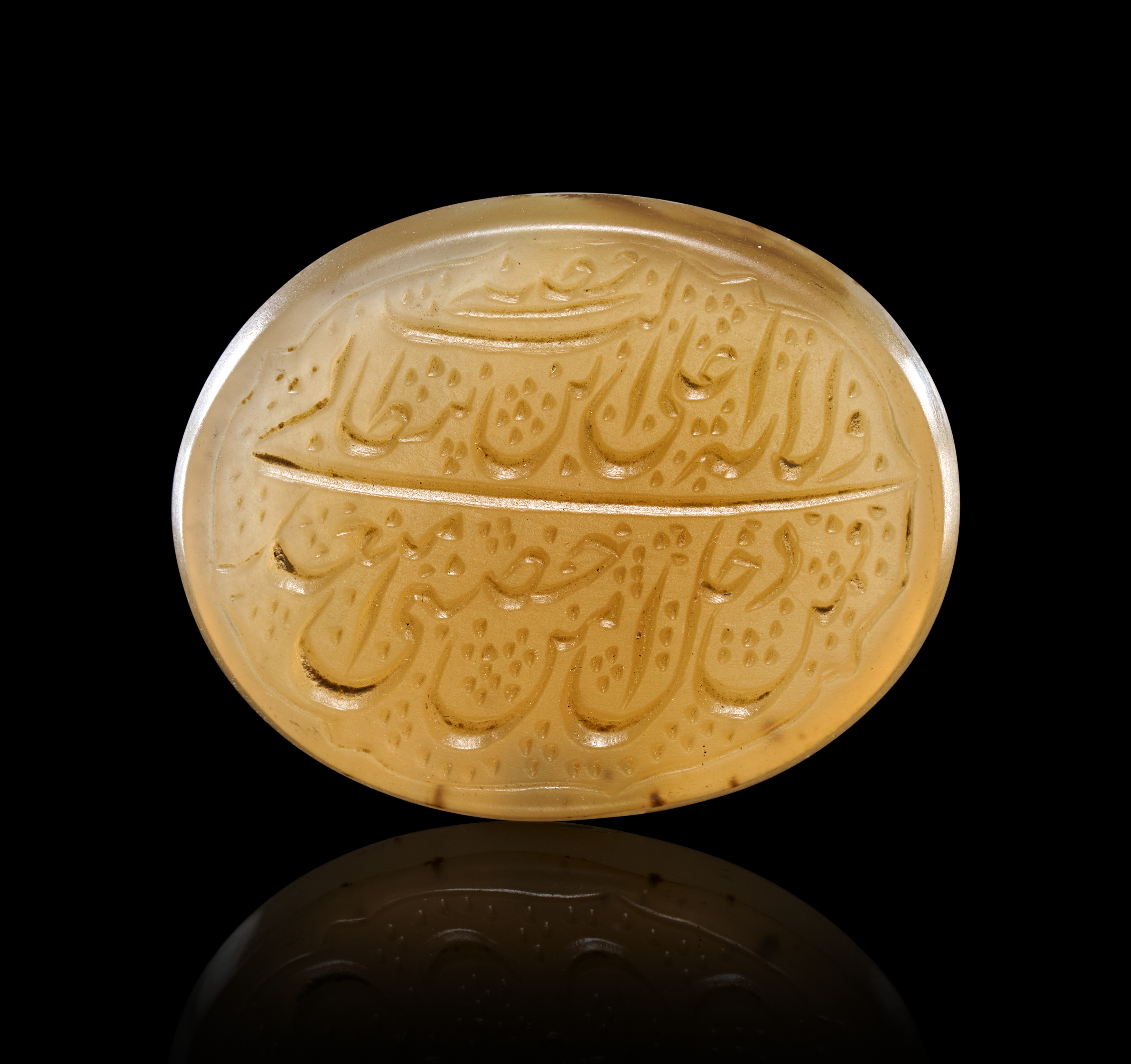 A PERSIAN TALISMANIC ENGRAVED CHALCEDONY SEAL STONE, 19TH CENTURY