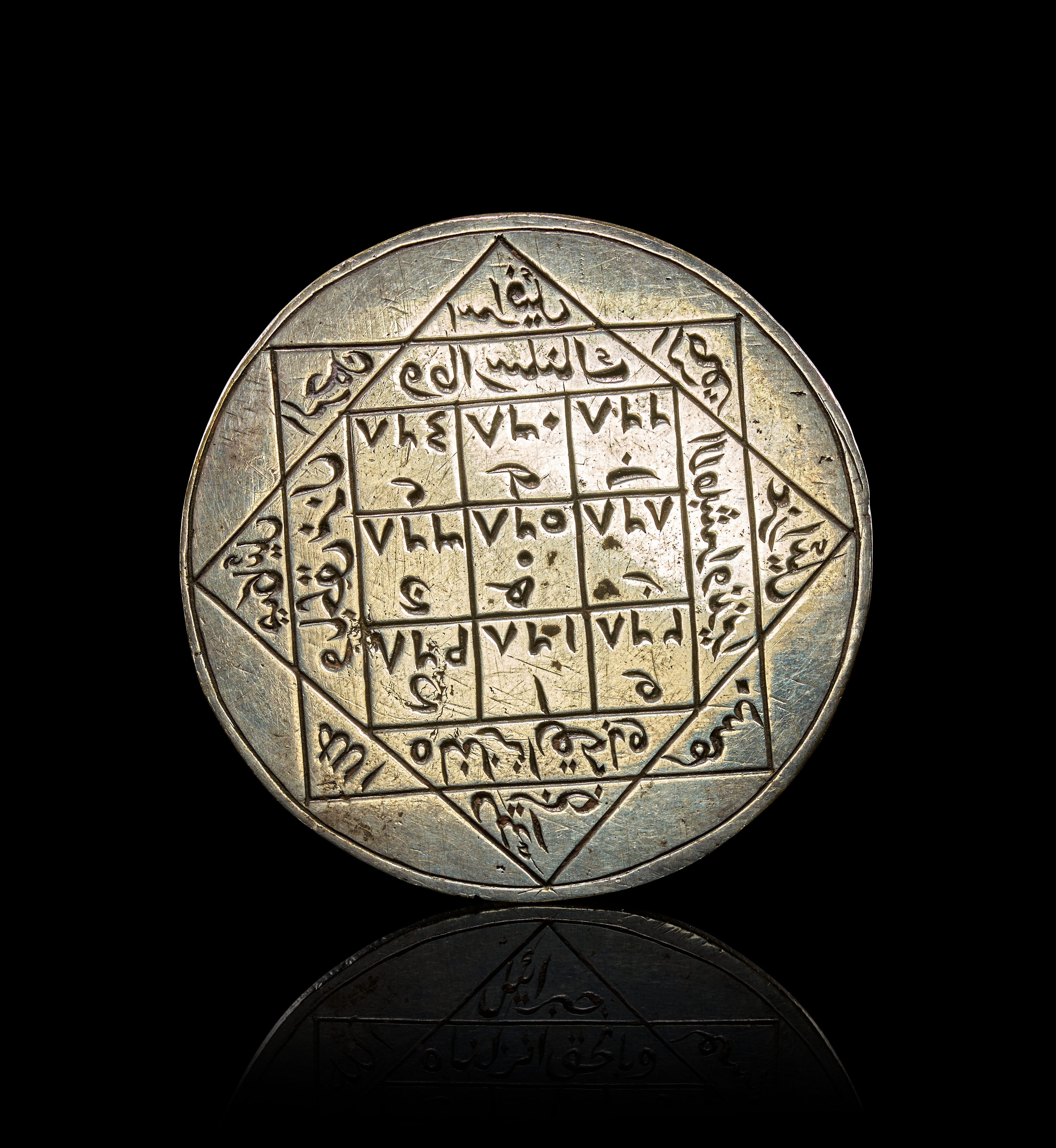 AN ENGRAVED SILVER PERSIAN TALISMANIC SUFI AMULET, ZAND OR QAJAR, 18TH CENTURY