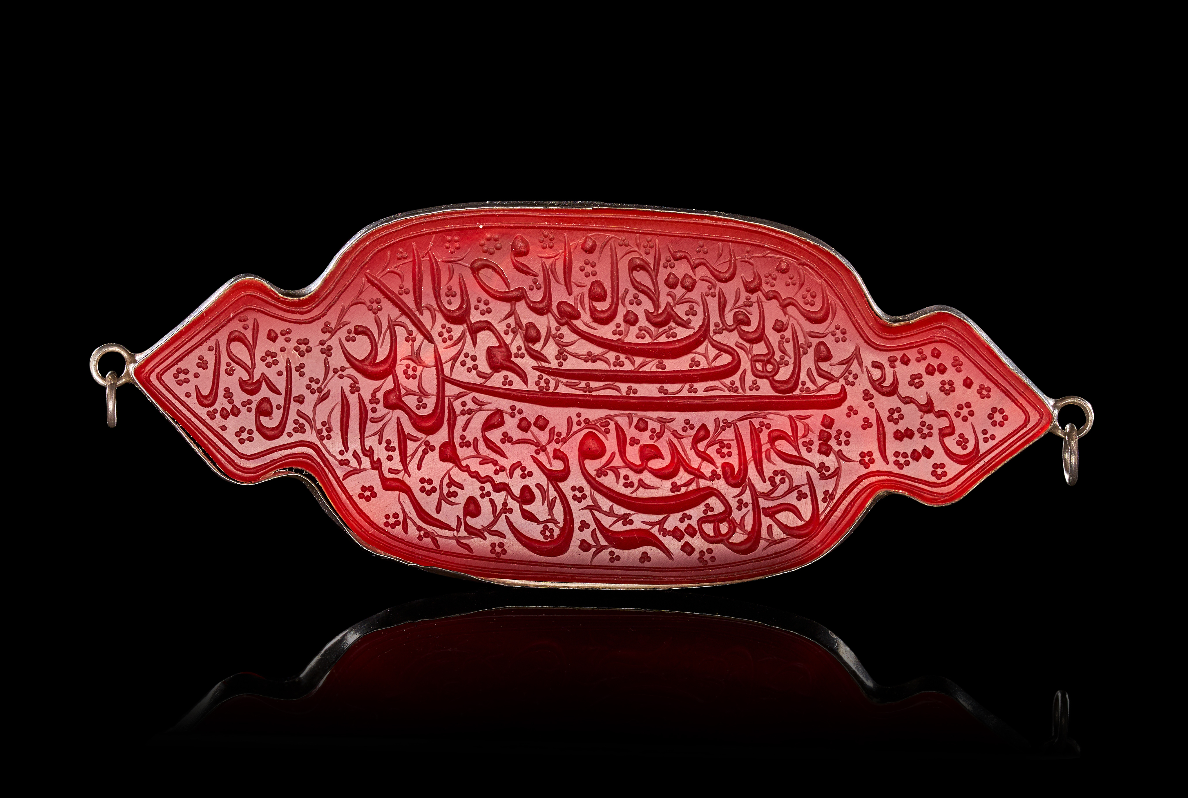 A LARGE INSCRIBED CARNELIAN TALISMANIC PENDANT, PERSIA, 19TH CENTURY