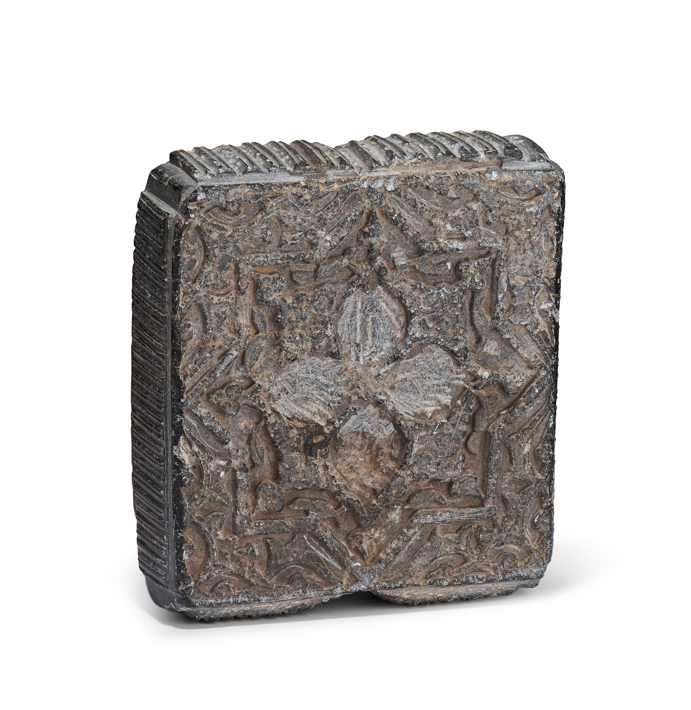 A TIMURID CARVED STONE TILE, CENTRAL ASIA, LATE 14TH - EARLY 15TH CENTURY