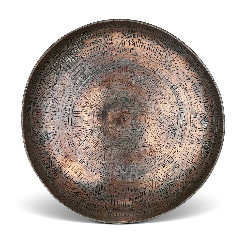 Lot 163: A PERSIAN TINNED COPPER MAGIC OR DIVINATION BOWL, SAFAVID, 18TH CENTURY