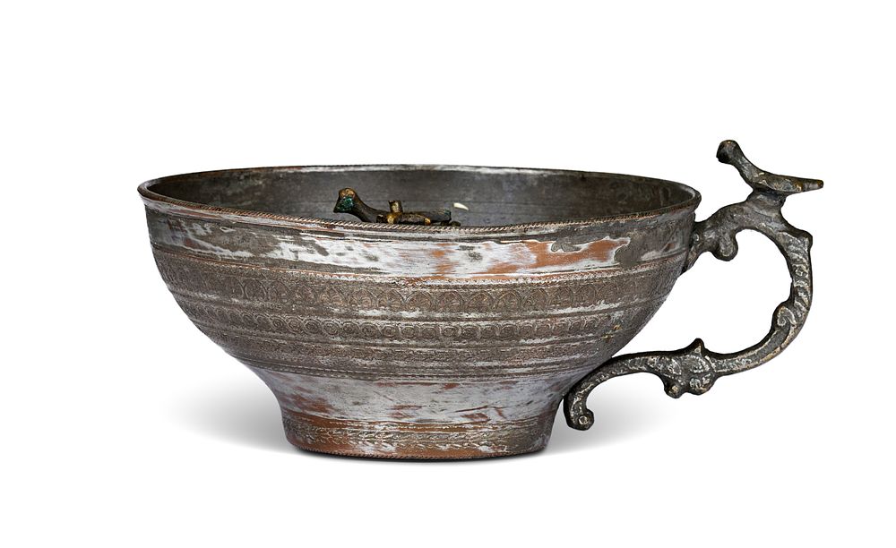 Lot 226: AN OTTOMAN TINNED COPPER AND BRONZE HANDLED FISH CUP, 19TH CENTURY