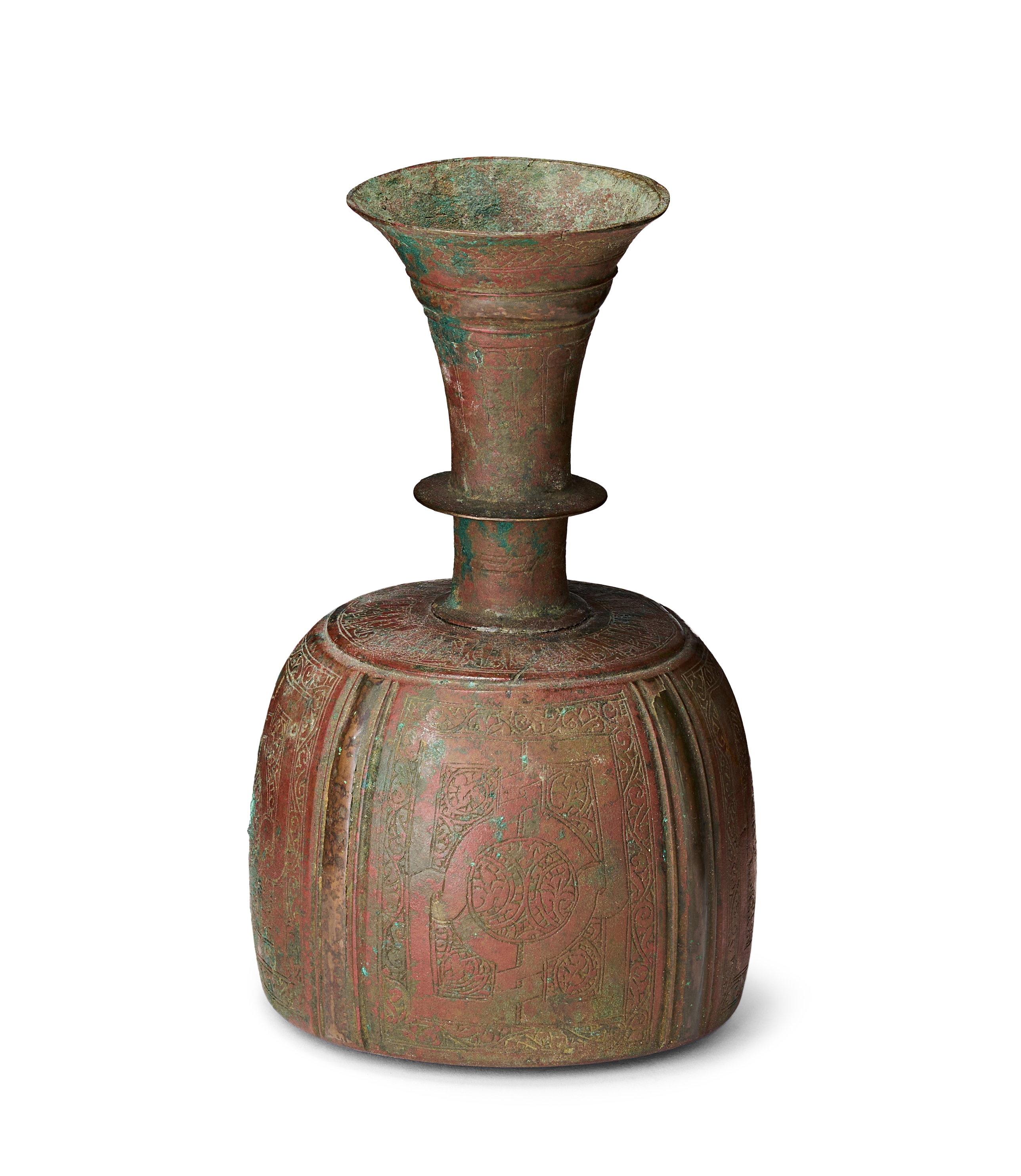A SELJUK BRONZE FLUTED BOTTLE, POSSIBLY KHORASAN, 12TH - 13TH CENTURY