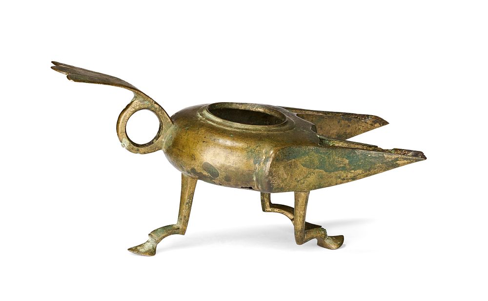 Lot 250: A BRONZE ALMOHAD DOUBLE SPOUTE OIL LAMP, SPAIN AL ANDALUS, 12TH CENTURY