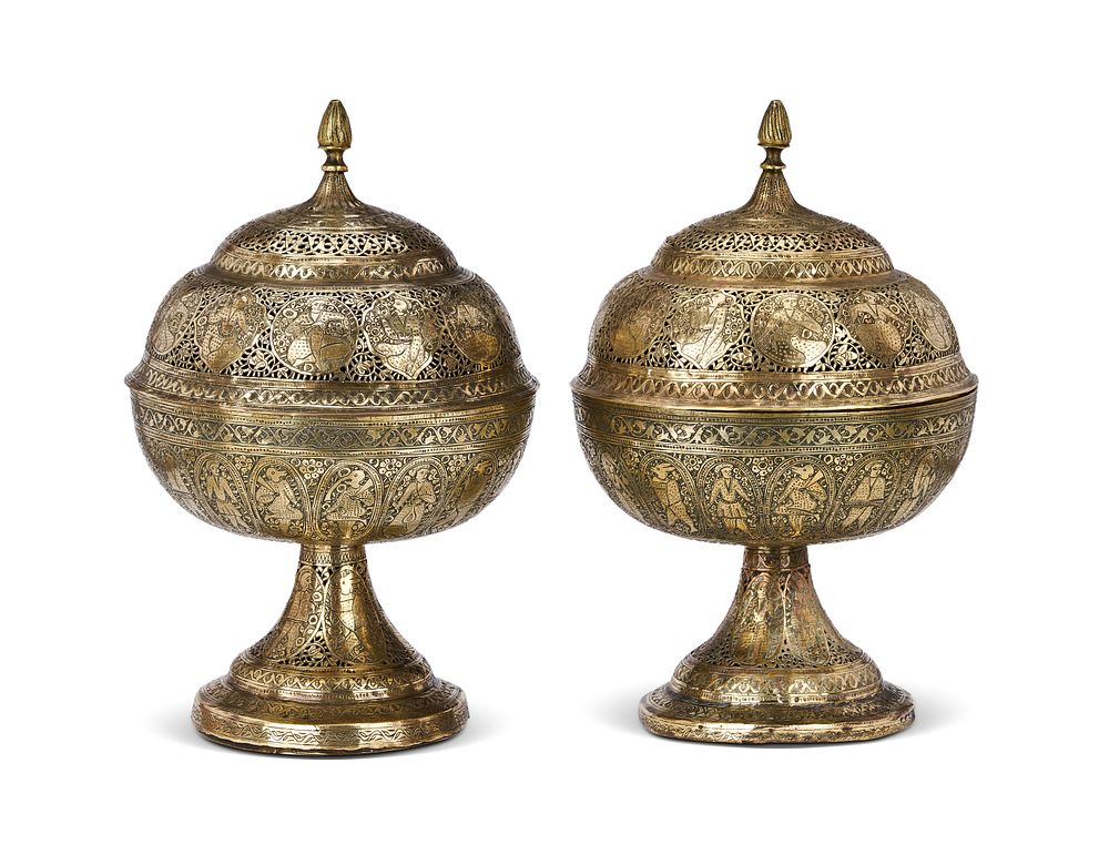 Lot 268: A PAIR OF PERSIAN PIERCED BRASS INCENSE BURNERS, QAJAR, 19TH CENTURY