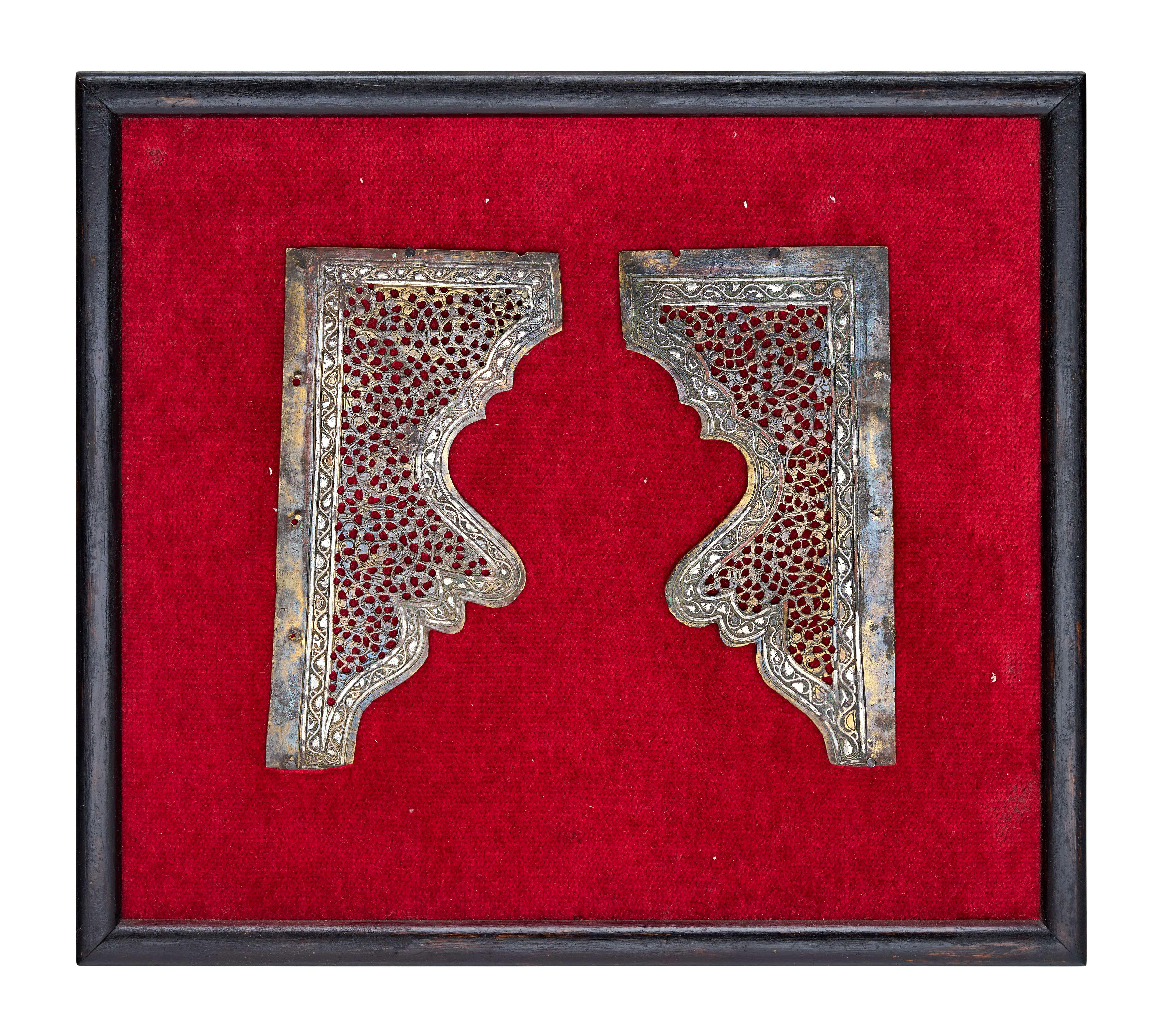 A RARE PAIR OF MAMLUK PIERCED SILVER INLAID BRASS PANEL/MIRROR SPANDRELS, EGYPT OR SYRIA, 14TH -15TH CENTURY