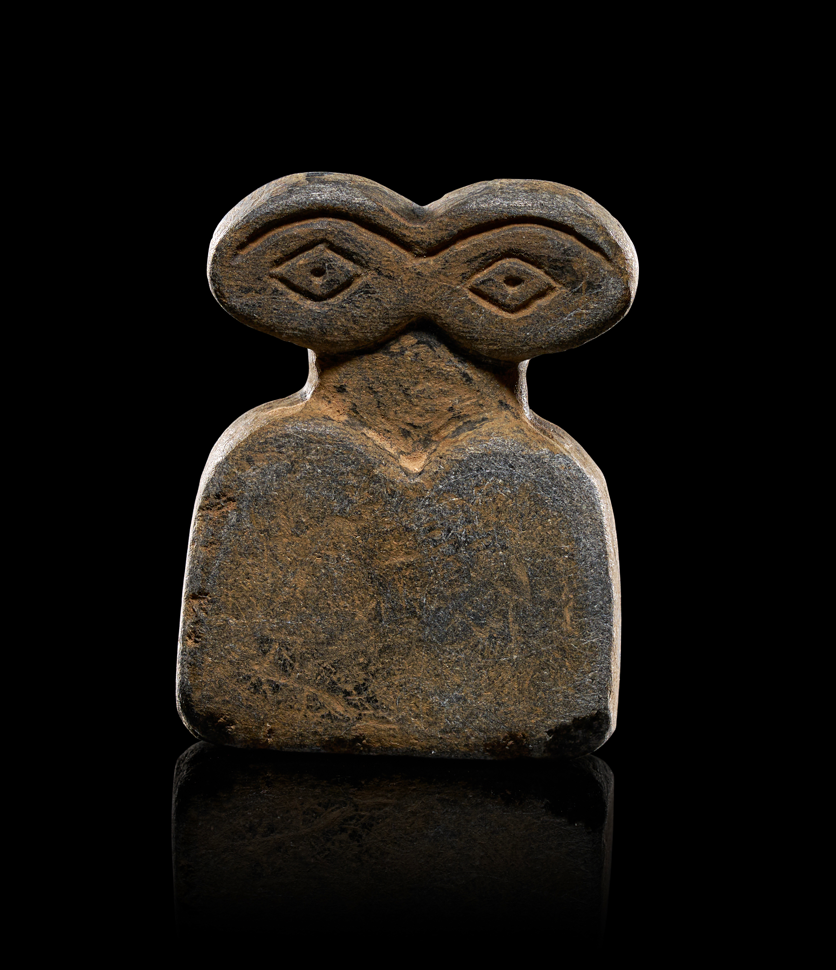 A TELL BRAK STONE EYE IDOL, CIRCA 3500–3300 BCE