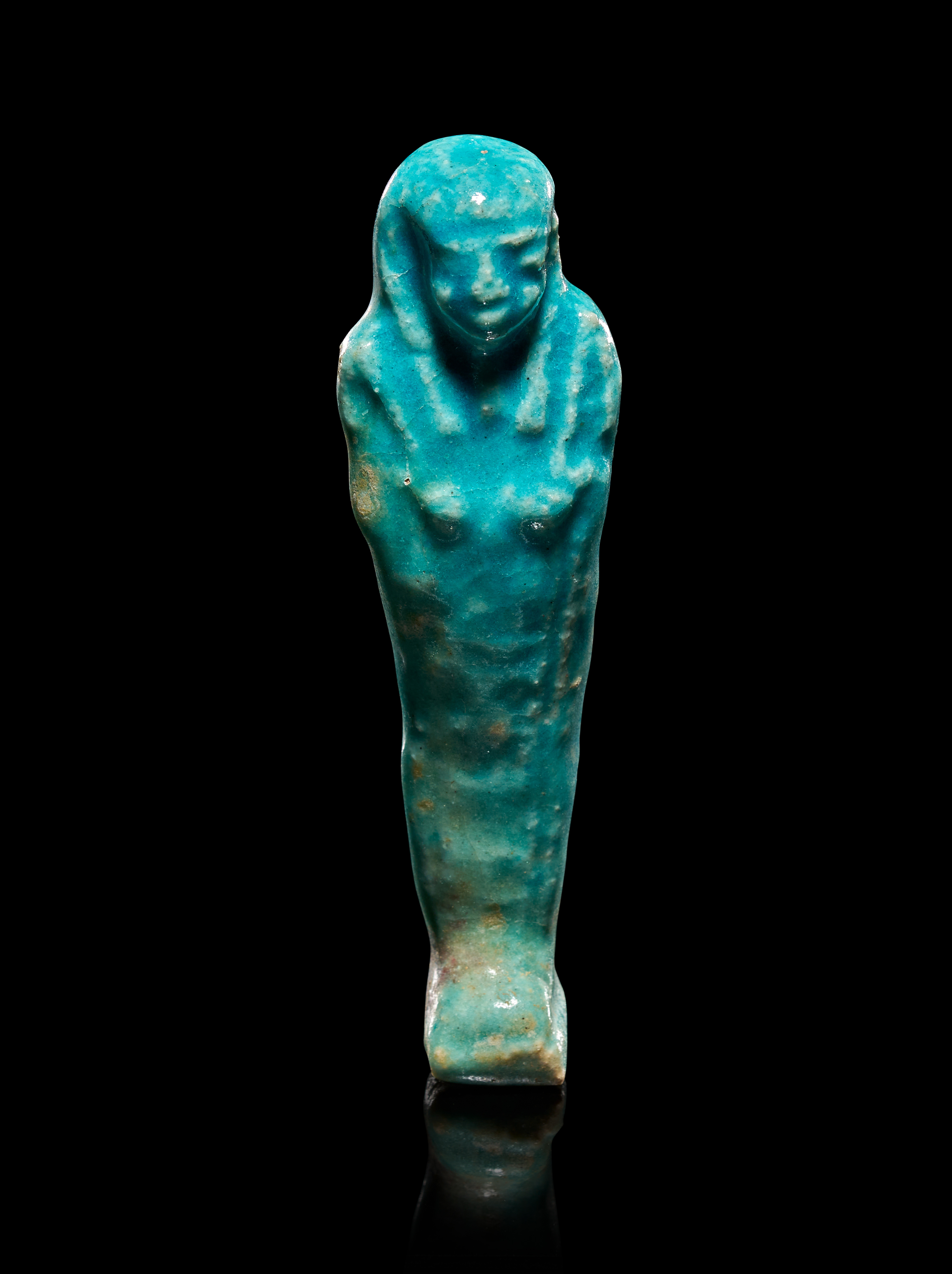 AN EGYPTIAN TURQUOISE FAIENCE SHABTI, 22ND DYNASTY LATE PERIOD 1800-600B.C.