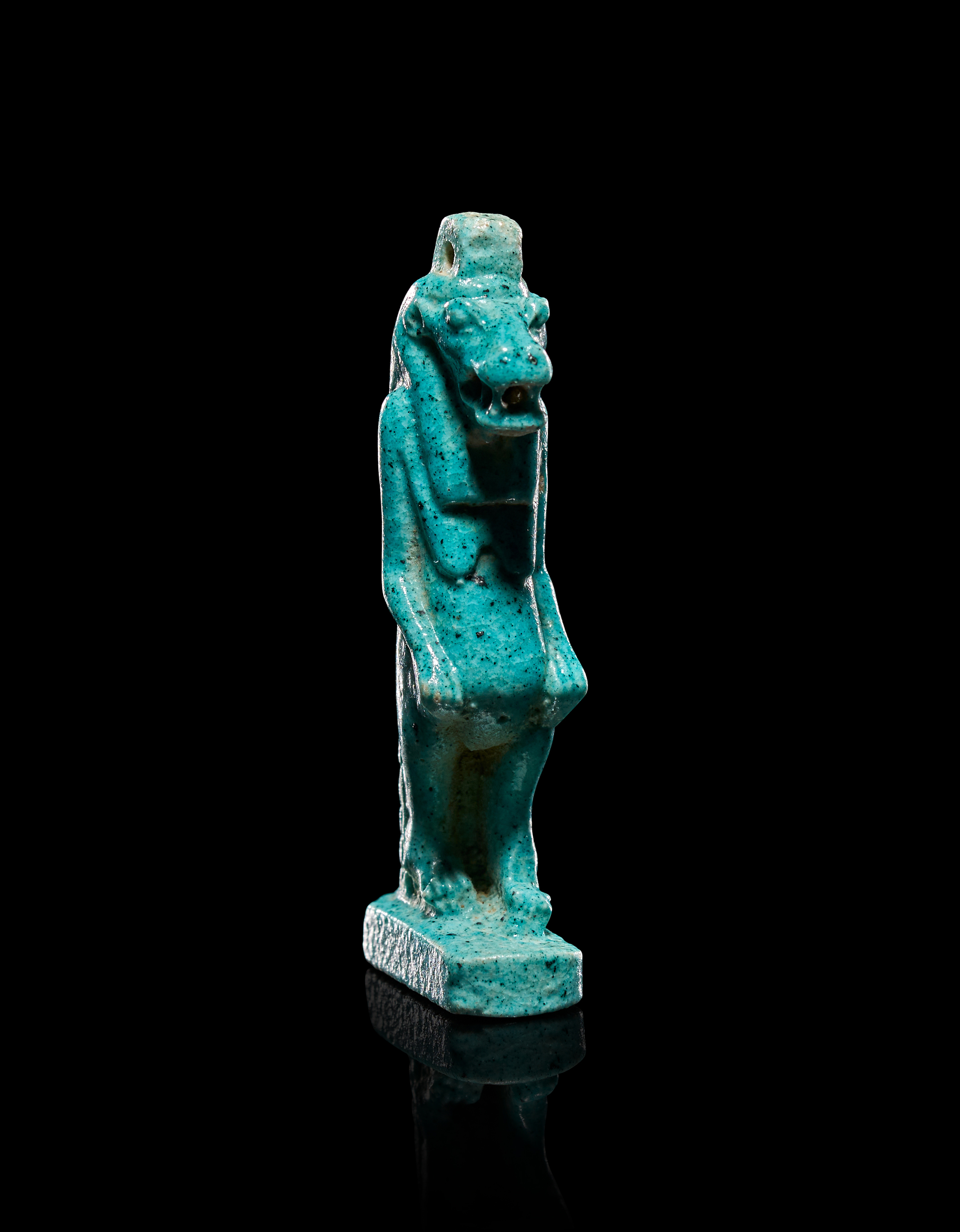 AN EGYPTIAN TURQUOISE GLAZED FAIENCE AMULET OF THE GODDESS TAWERET, LATE PERIOD, CIRCA 664 - 332 BC