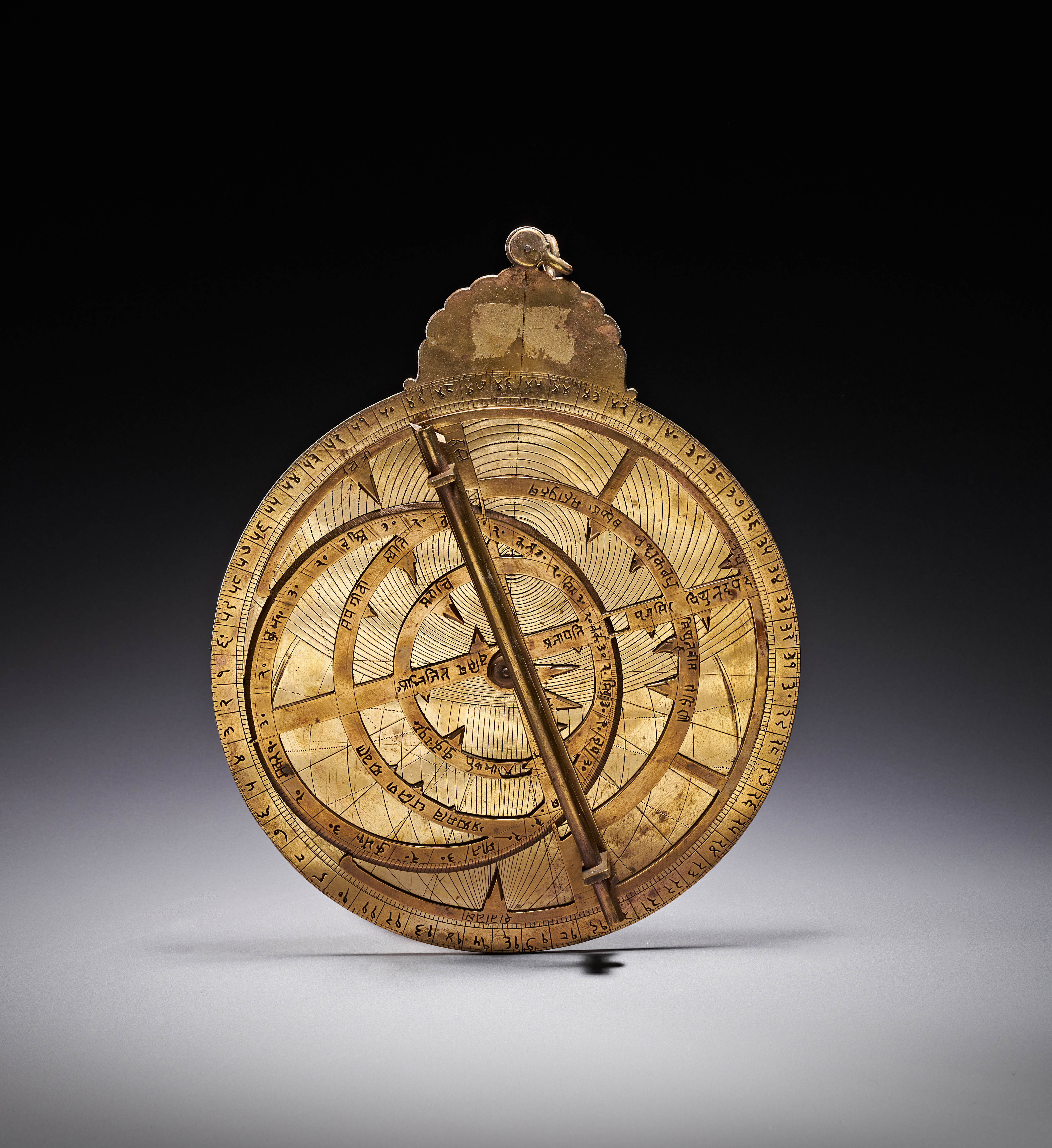 A MUGHAL BRASS PLANISPHERIC ASTROLABE WITH DEVANAGARI SCRIPT, INDIA, 18TH CENTURY