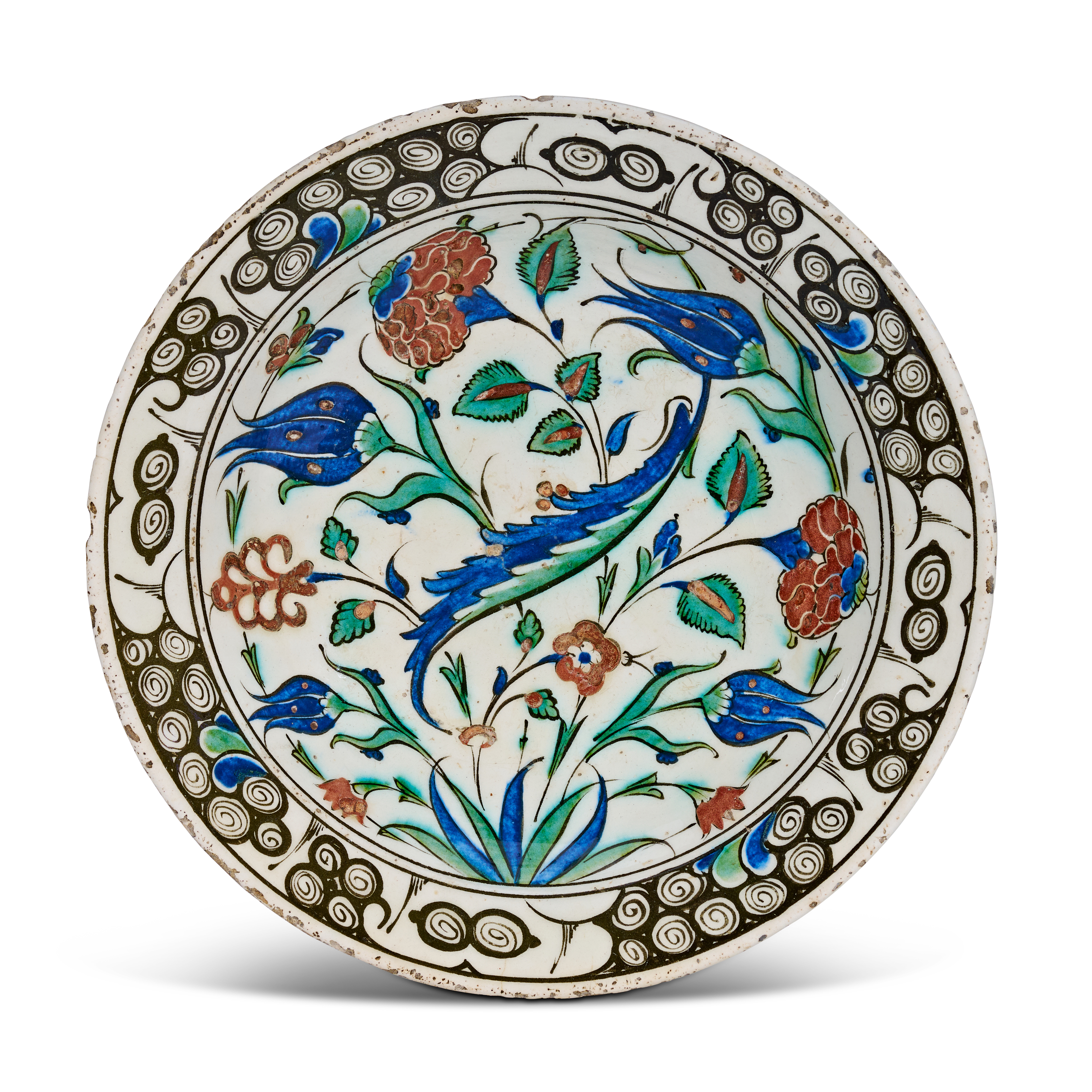 AN IZNIK POTTERY DISH, OTTOMAN TURKEY, LATE 16TH CENTURY