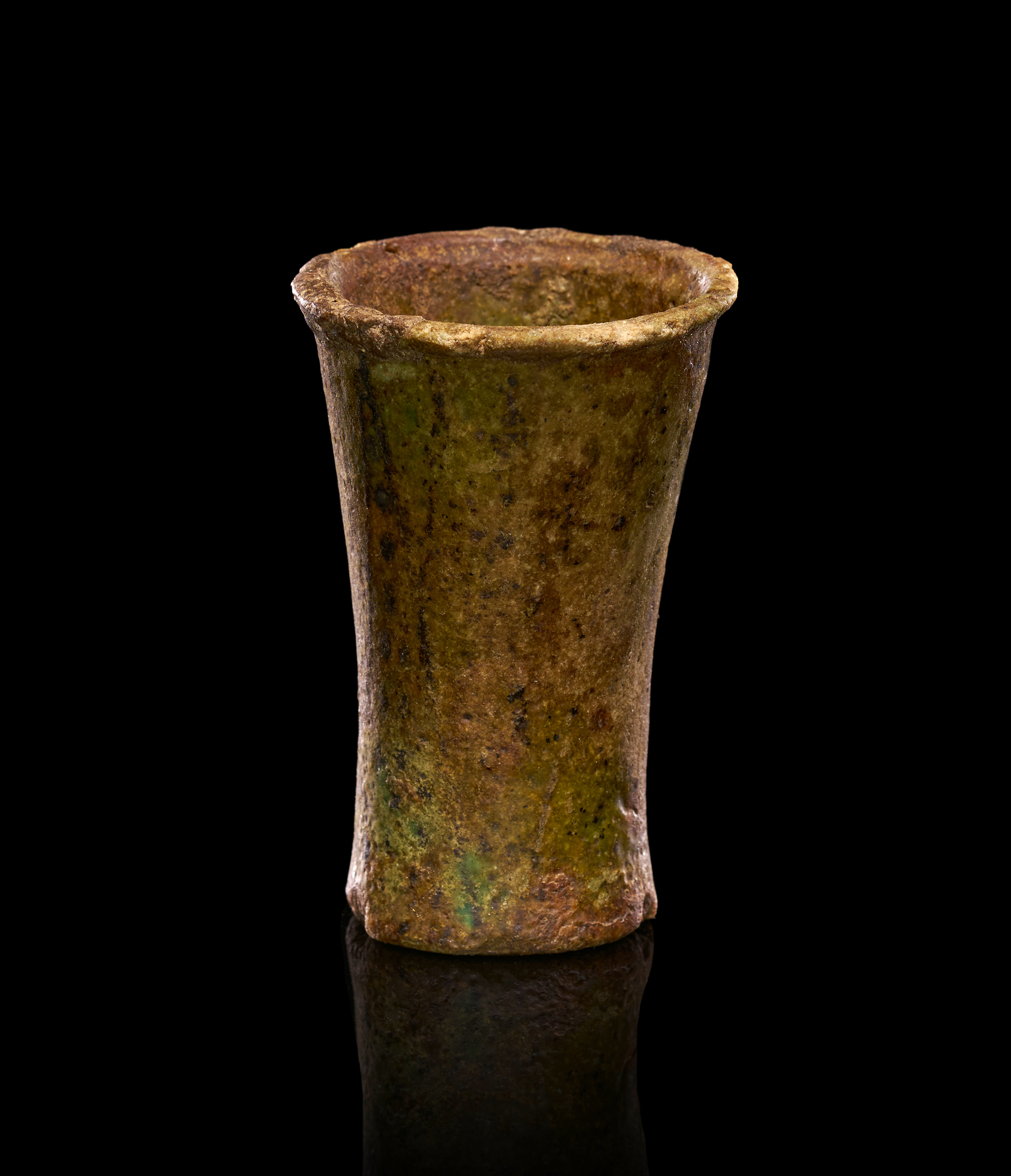 AN EGYPTIAN GREEN GLAZED EARTHENWARE COSMETIC JAR, NEW KINGDOM, 18TH DYNASTY, 1550-1295 B.C.