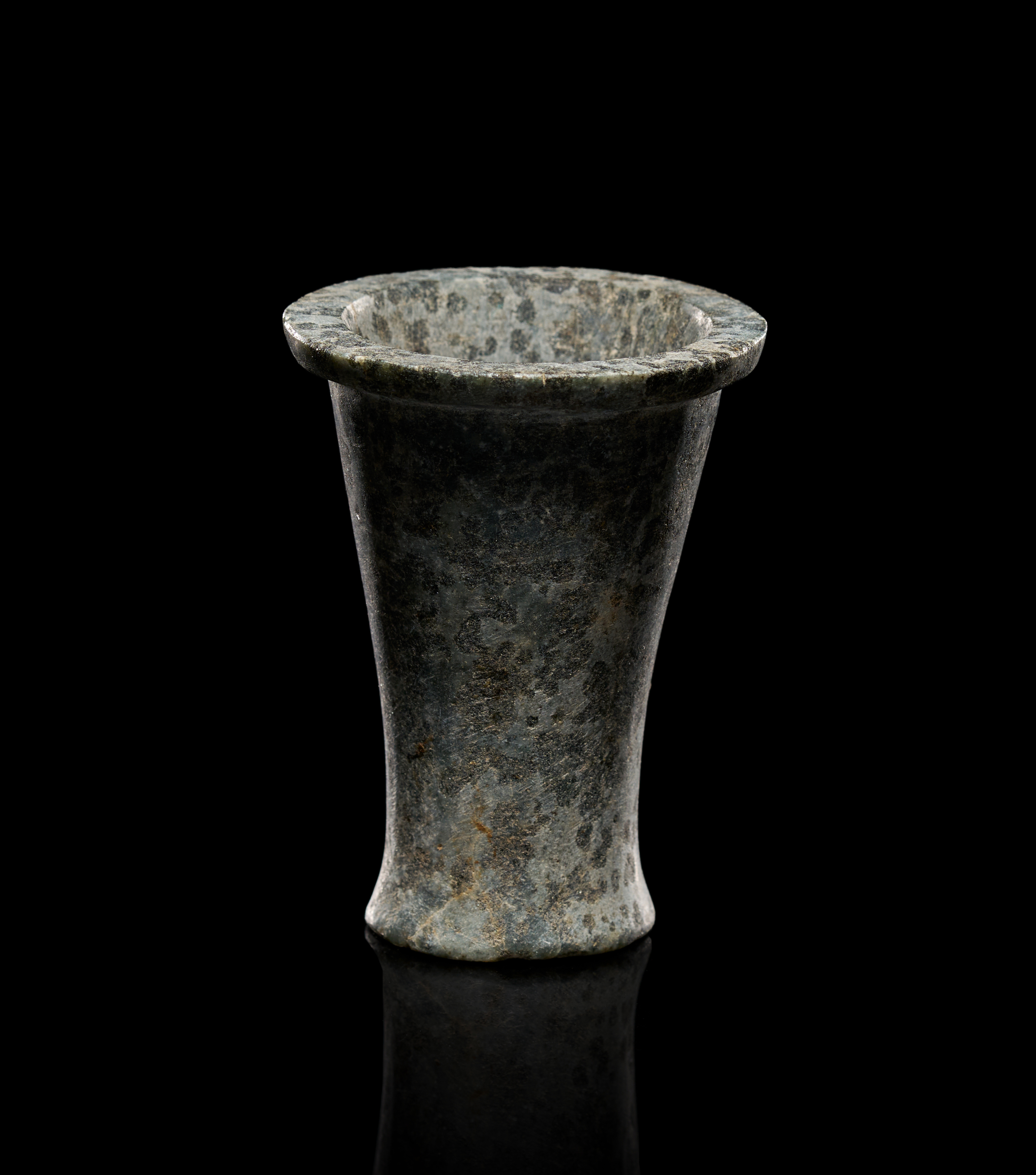 AN EGYPTIAN DIORITE COSMETIC JAR, NEW KINGDOM, 18TH DYNASTY, 1550-1295 B.C.