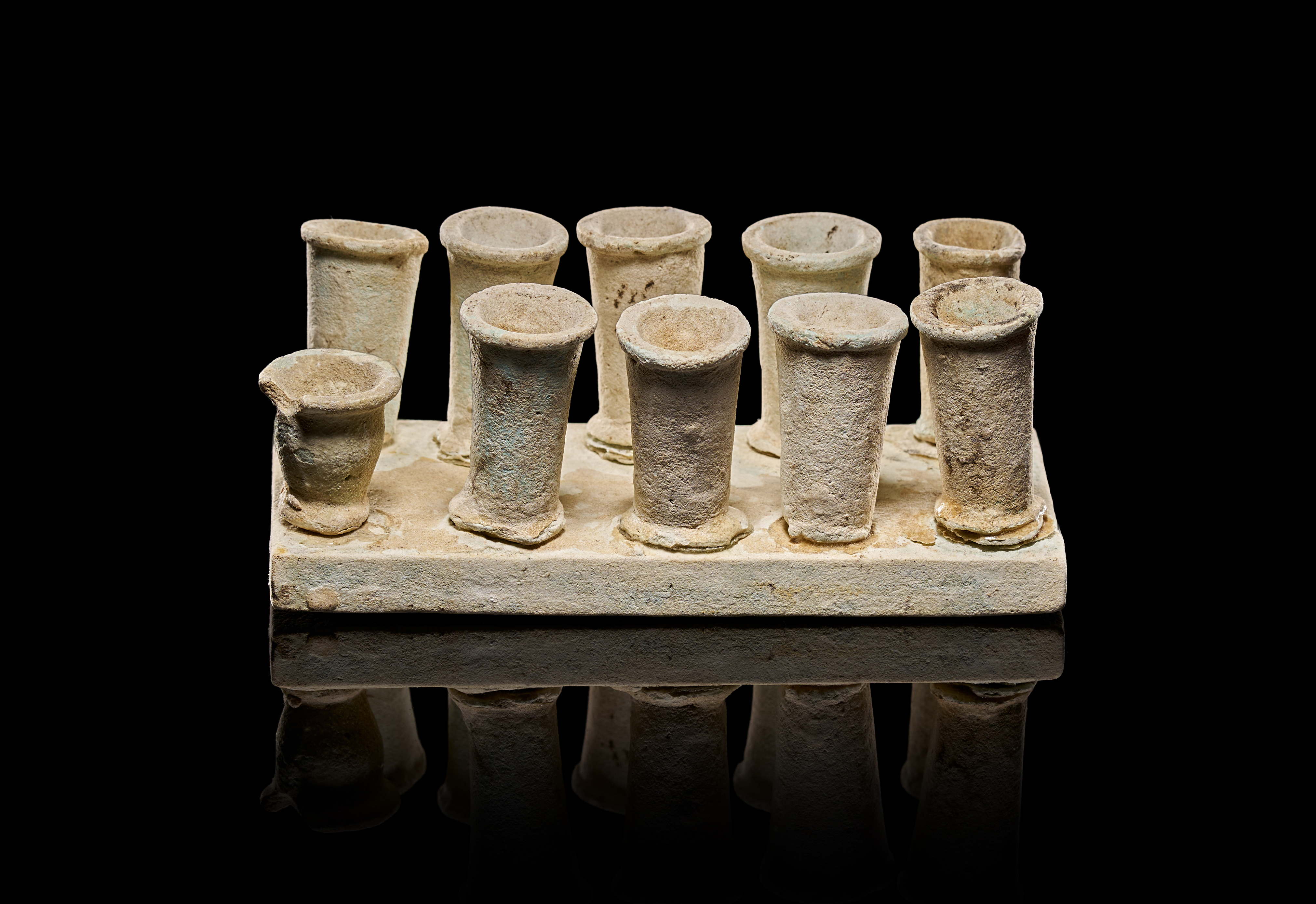 A GLAZED FAIENCE CONTAINERS LIBATION TRAYS, 28TH DYNASTY OF EGYPT