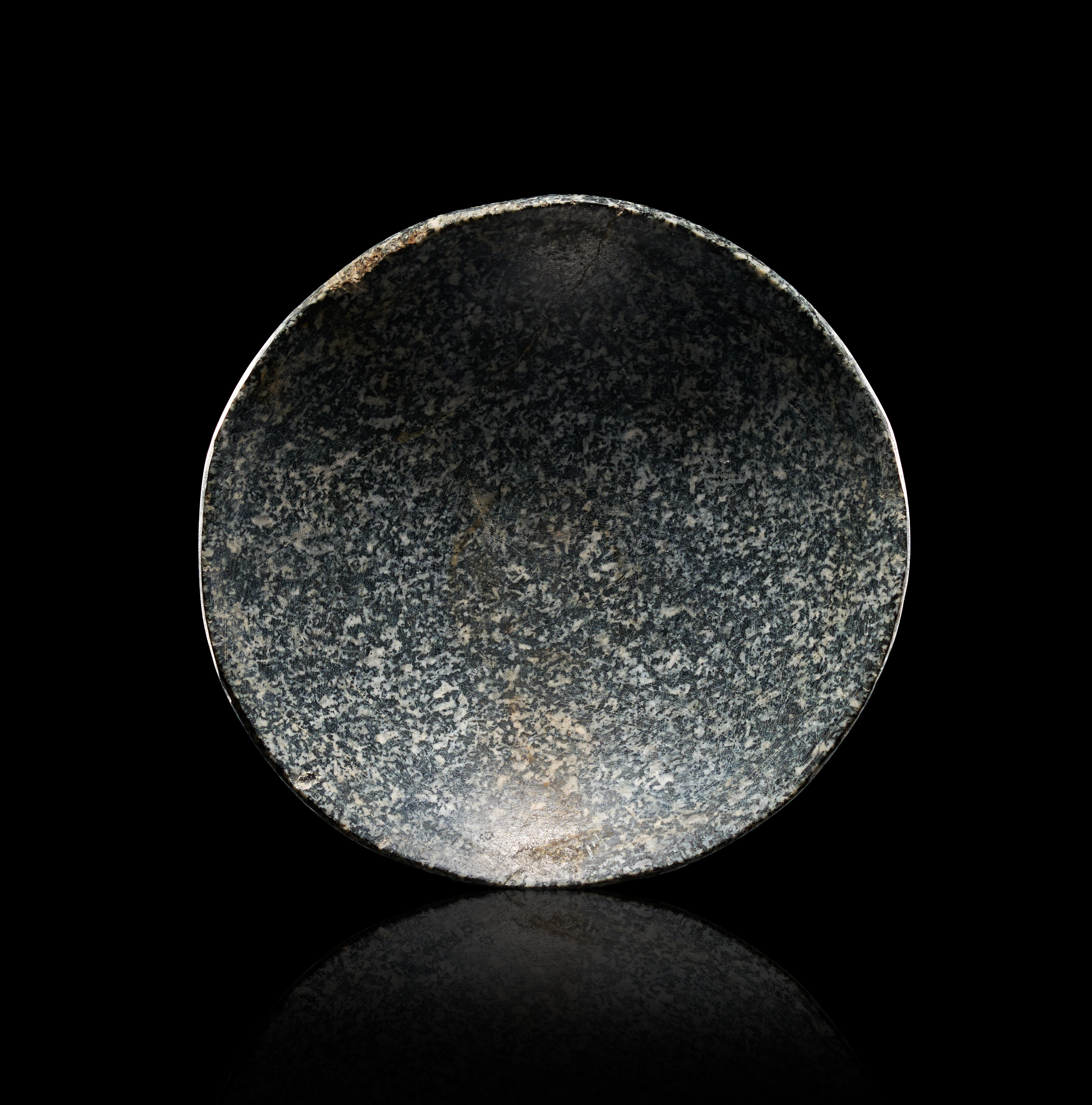 AN EGYPTIAN DIORITE BOWL EARLY DYNASTIC PERIOD, 1ST-2ND DYNASTY, CIRCA 3000-2650 B.C.