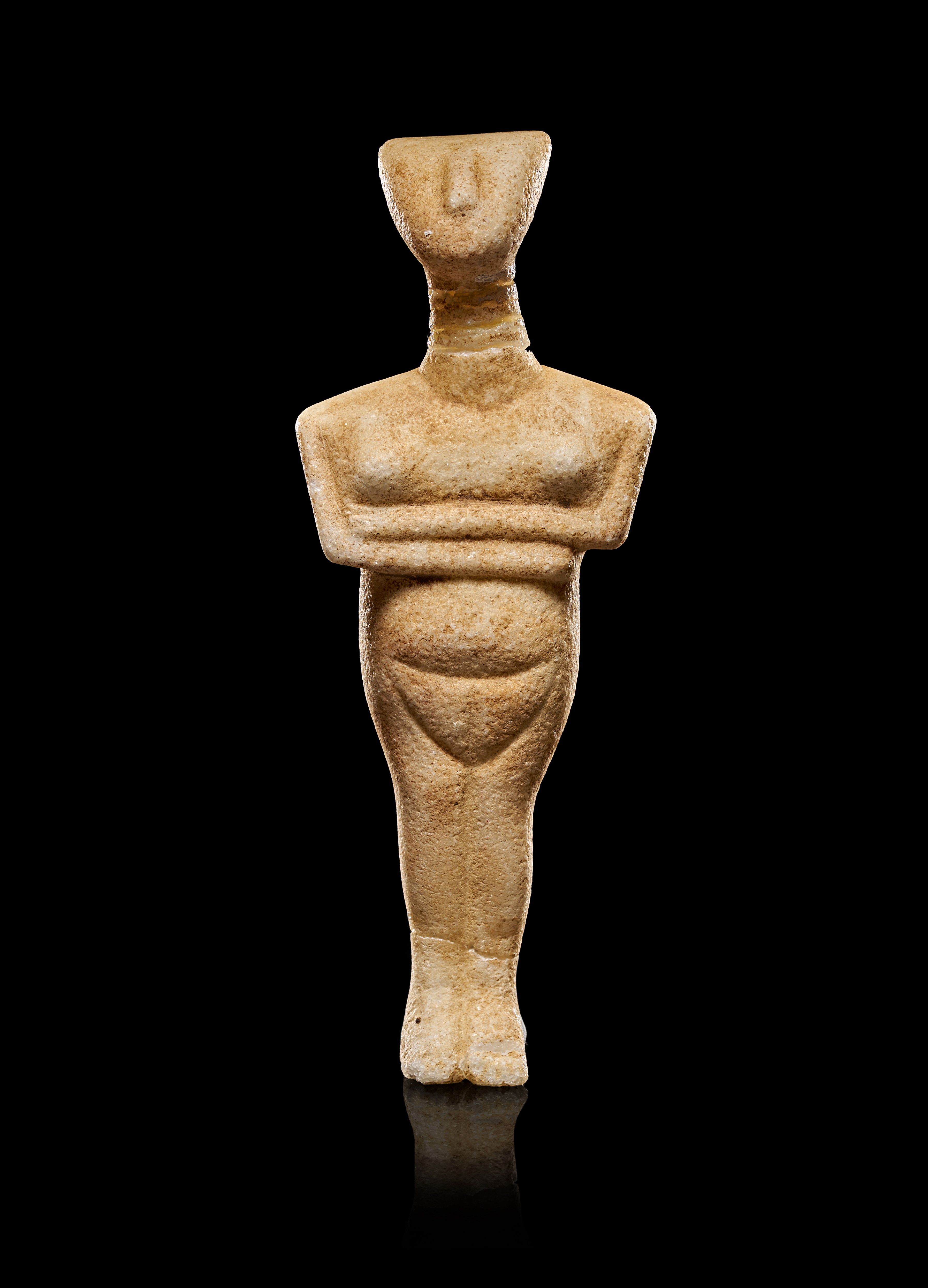 A CYCLADIC MARBLE FEMALE FIGURE, EARLY SPEDOS VARIETY, CIRCA 2600-2500 B.C.