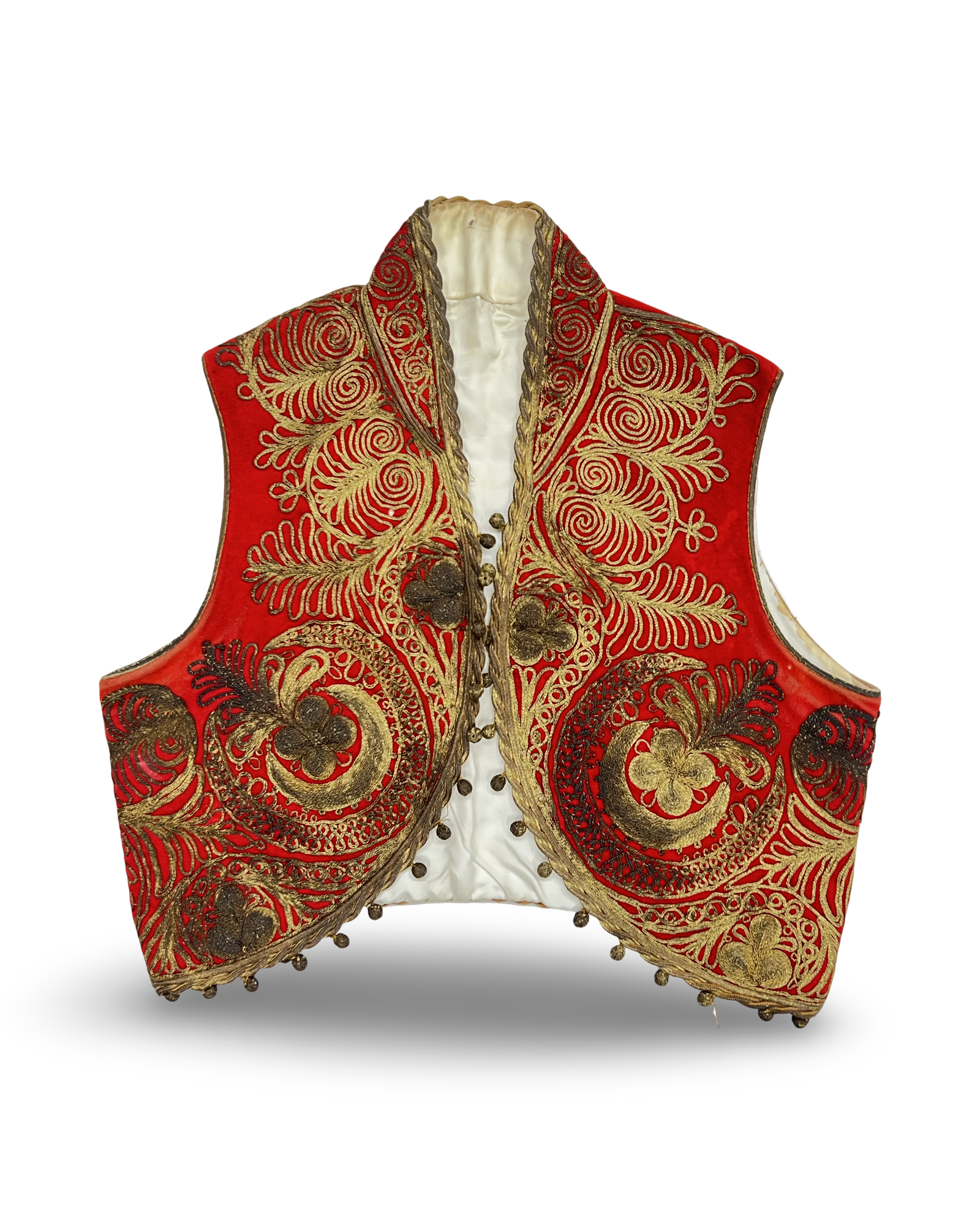 AN OTTOMAN BALKAN GOLD-THREAD EMBROIDERED RED VELVET JELEK, LATE 19TH OR EARLY 20TH CENTURY
