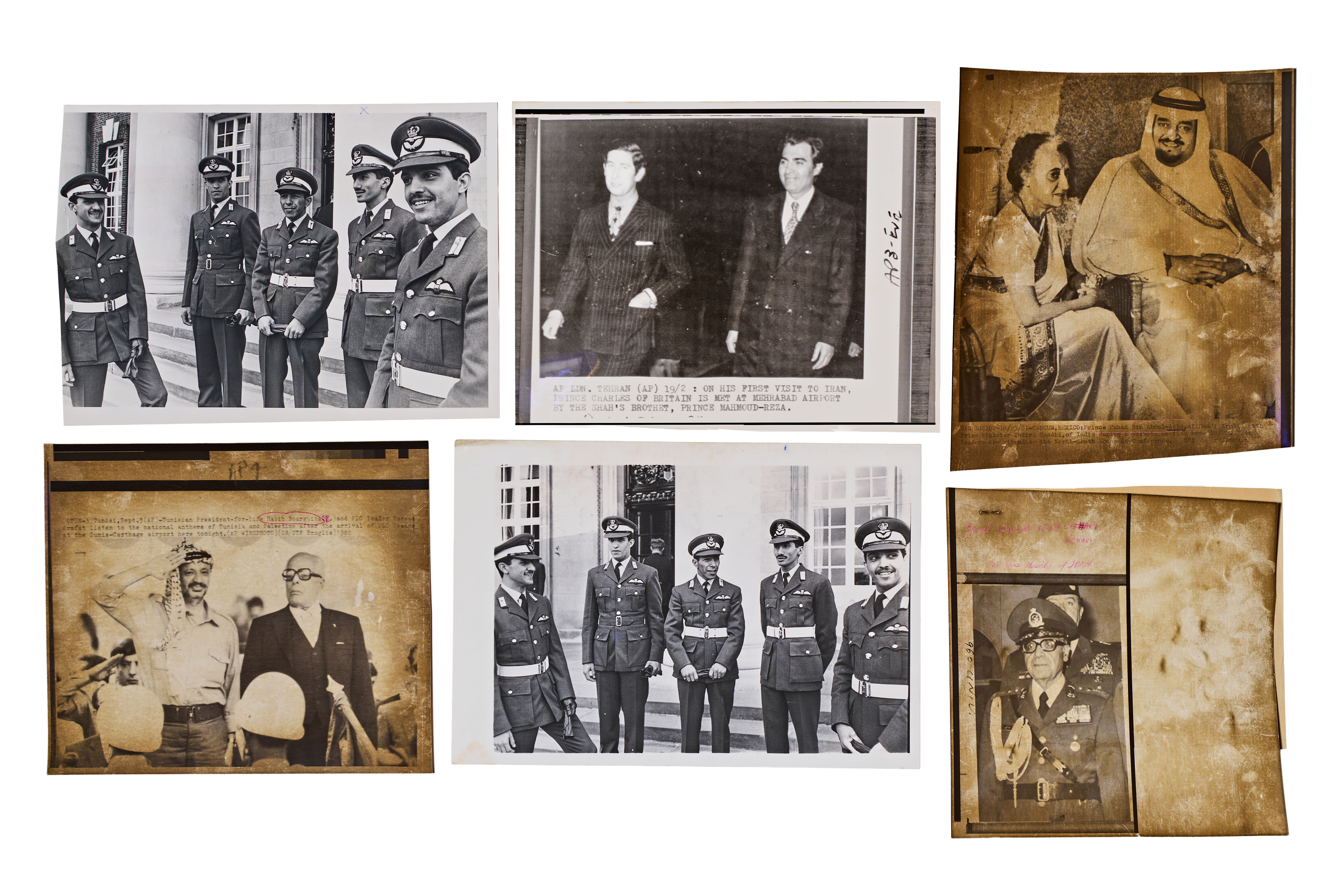 A COLLECTION OF SIX VINTAGE PRESS PHOTOGRAPHS DEPICTING INTERNATIONAL ARAB ROYALTY AND POLITICAL LEADERS