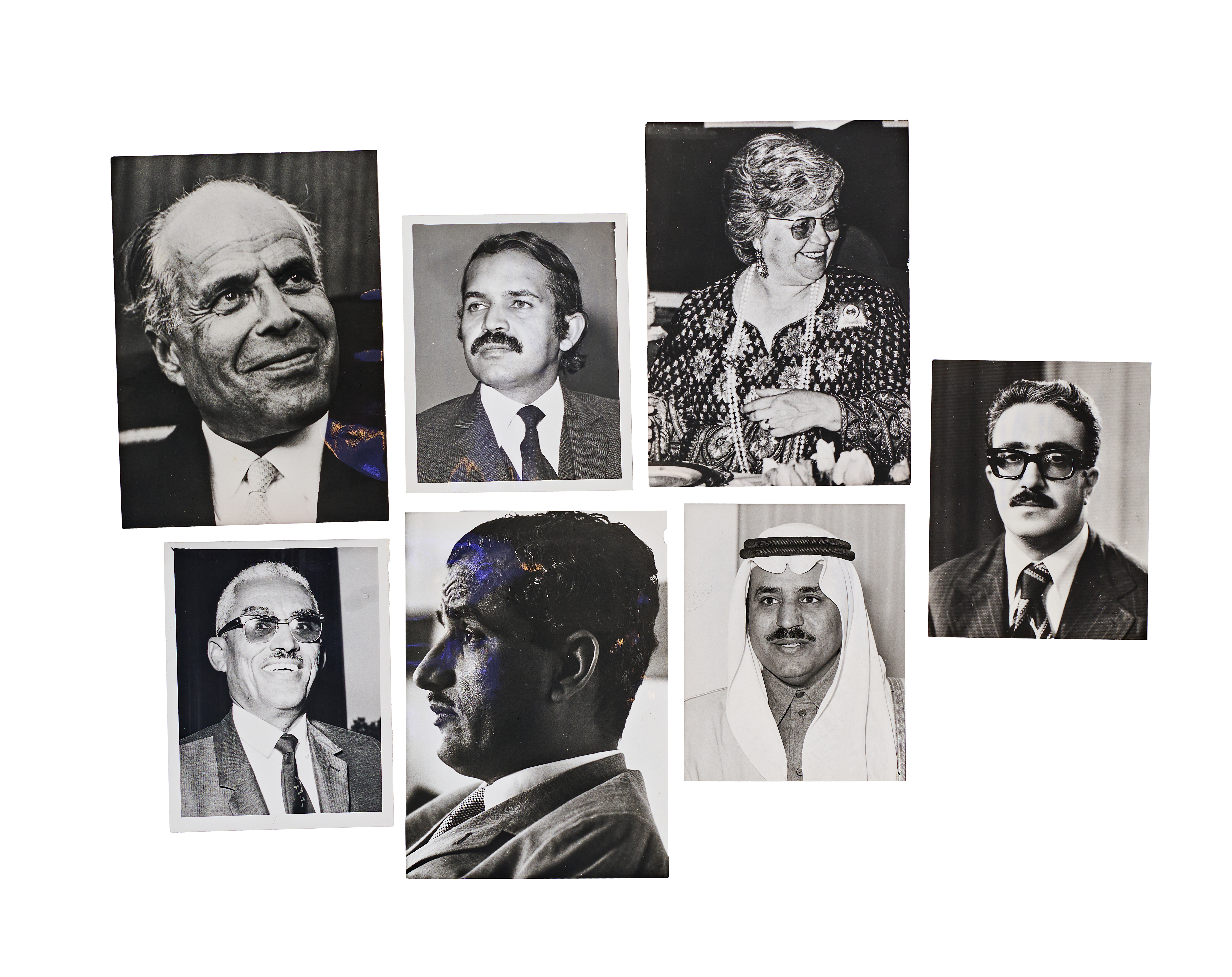 A COLLECTION OF SEVEN VINTAGE SILVER GELATIN PRESS PHOTOGRAPHS DEPICTING MIDDLE EASTERN AND NORTH AFRICAN POLITICAL FIGURES