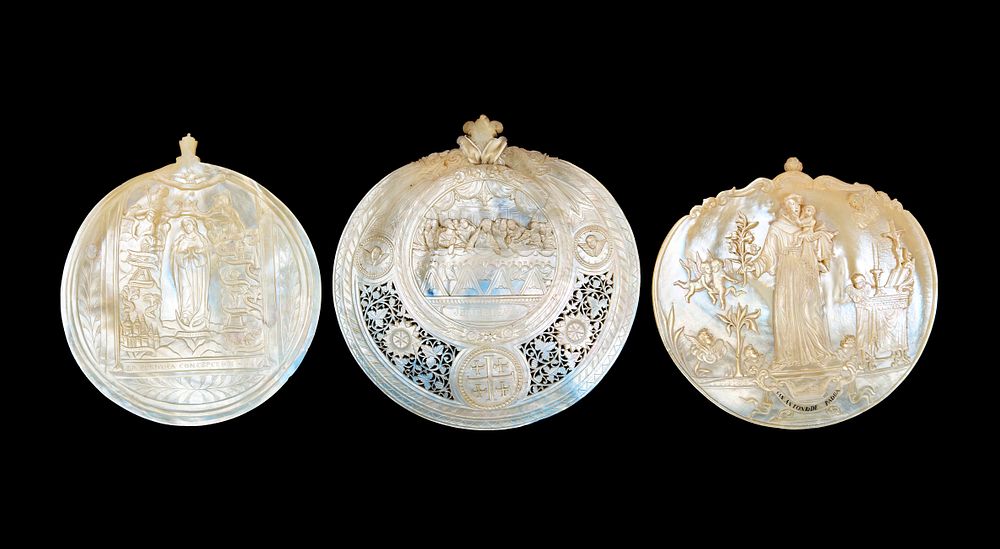 Lot 206: A TRIO OF LARGE CARVED MOTHER-OF-PEARL DEVOTIONAL SHELL PLAQUES, BETHLEHEM, 19TH CENTURY