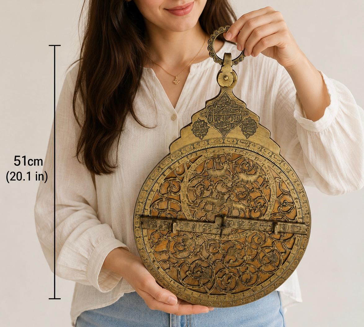 A MONUMENTAL QAJAR PLANISPHERIC BRASS ASTROLABE, PERSIA, 19TH CENTURY