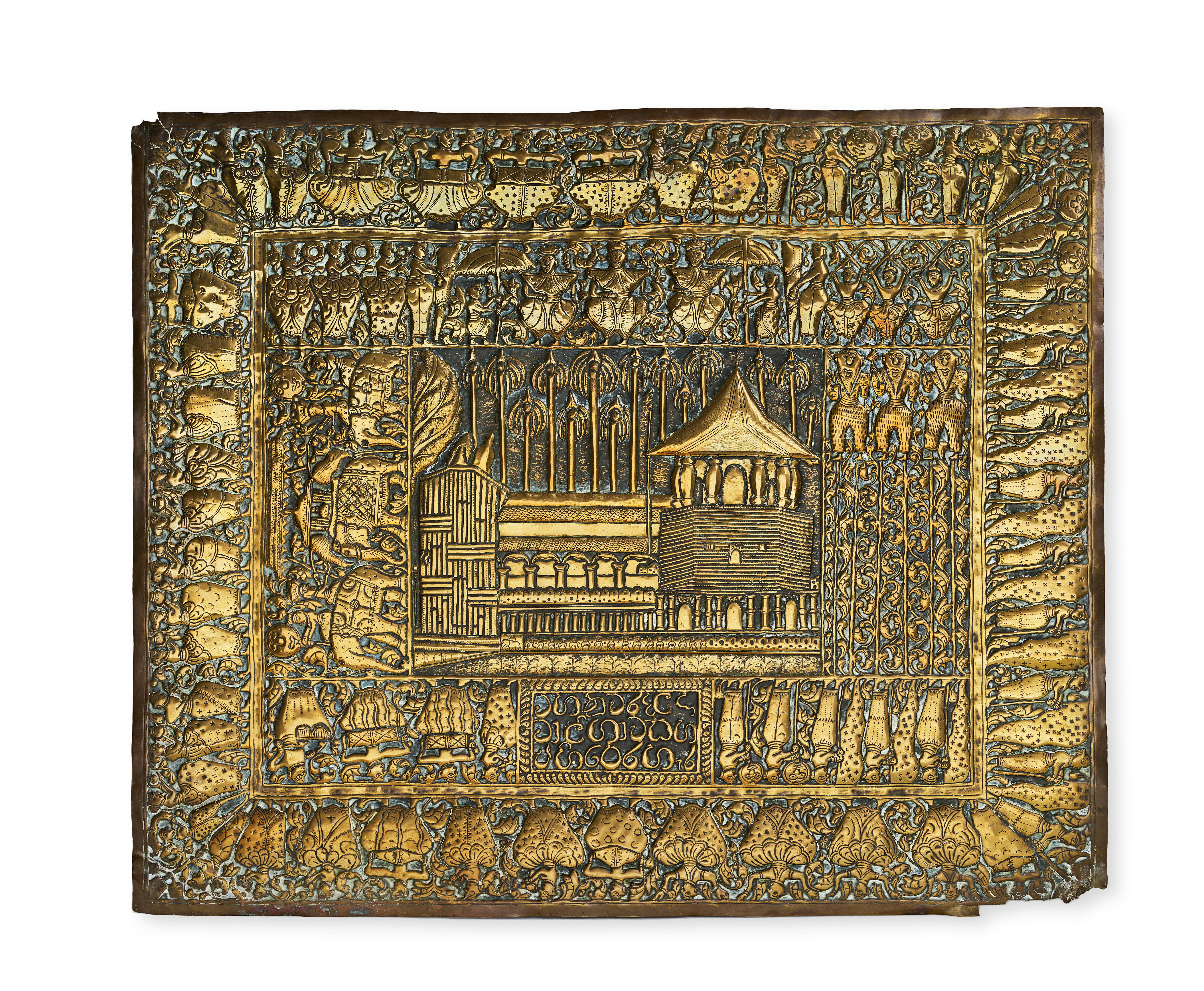 A BRASS REPOUSSE PLAQUE DEPICTING THE TEMPLE OF THE SACRED TOOTH RELIC, SRI LANKA, LATE 19TH - EARLY 20TH CENTURY