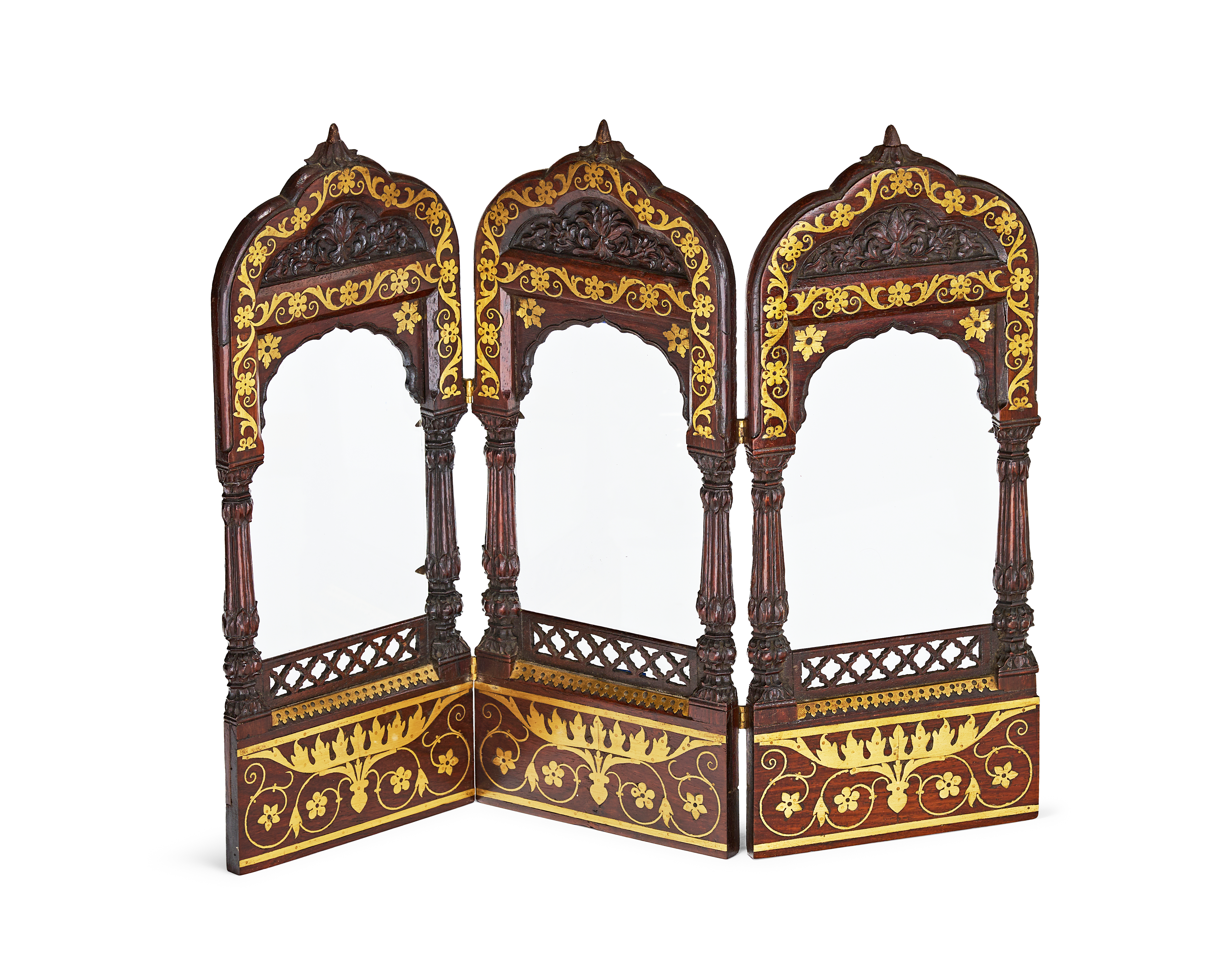 AN ANGLO-INDIAN CARVED ROSEWOOD AND BRASS-INLAID TRIPTYCH MIRROR FRAME, LATE 19TH OR EARLY 20TH CENTURY