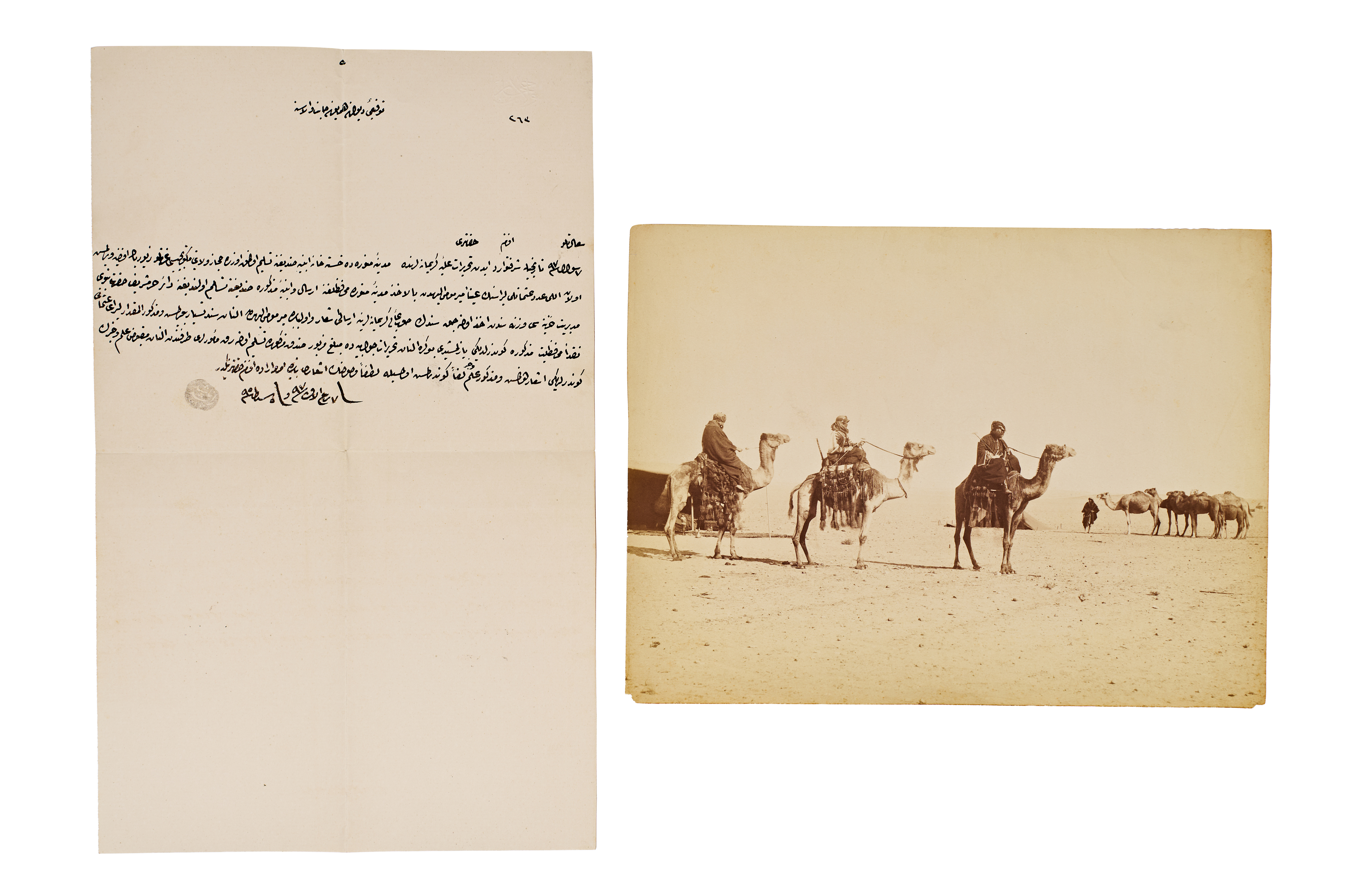 AN ALBUMEN PRINT OF CAMEL RIDERS IN A DESERT LANDSCAPE AND AN ACCOMPANYING OTTOMAN MANUSCRIPT LETTER