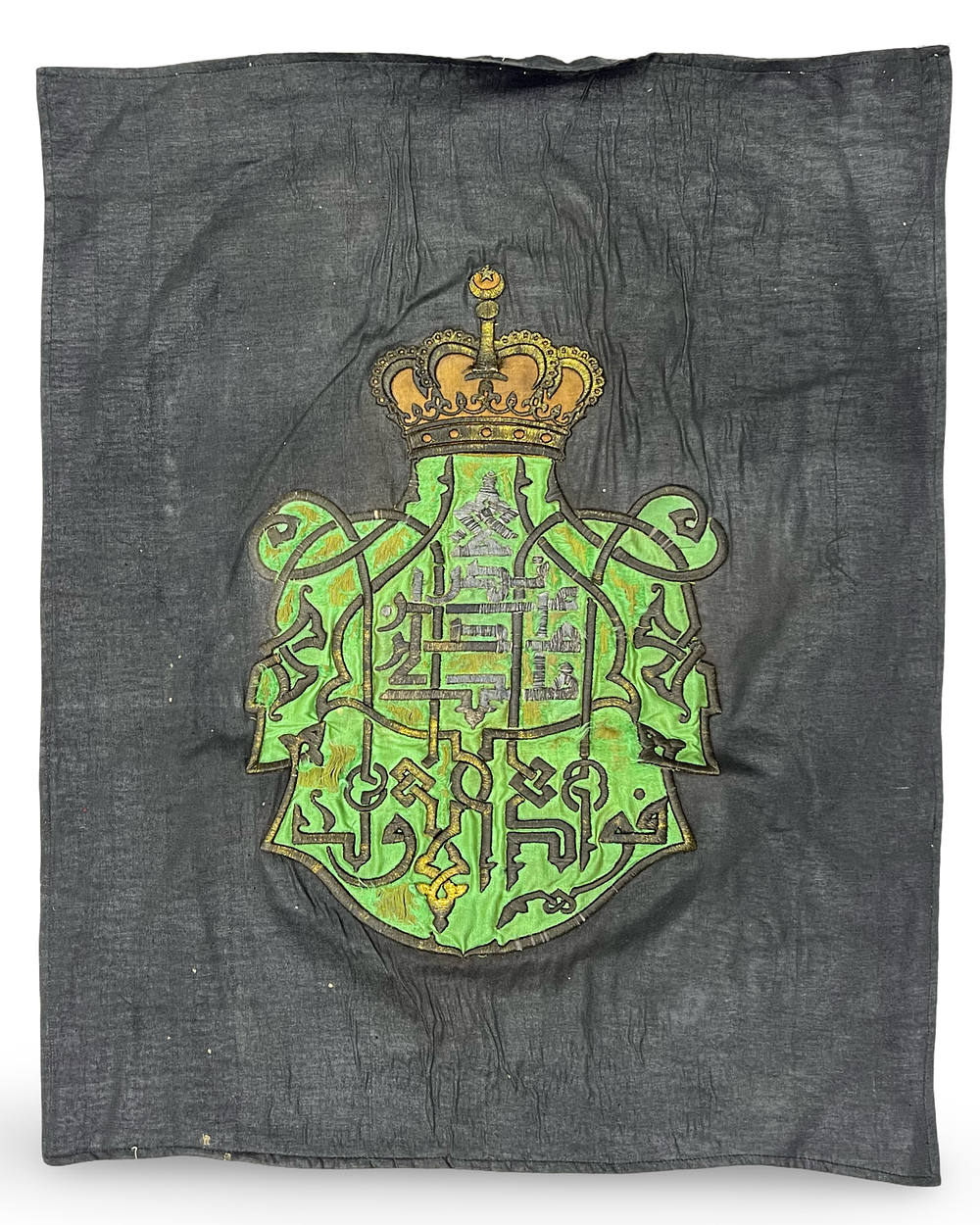 Lot 317: A ROYAL EGYPTIAN EMBROIDERED HERALDIC TEXTILE PANEL OF KING FUAD I