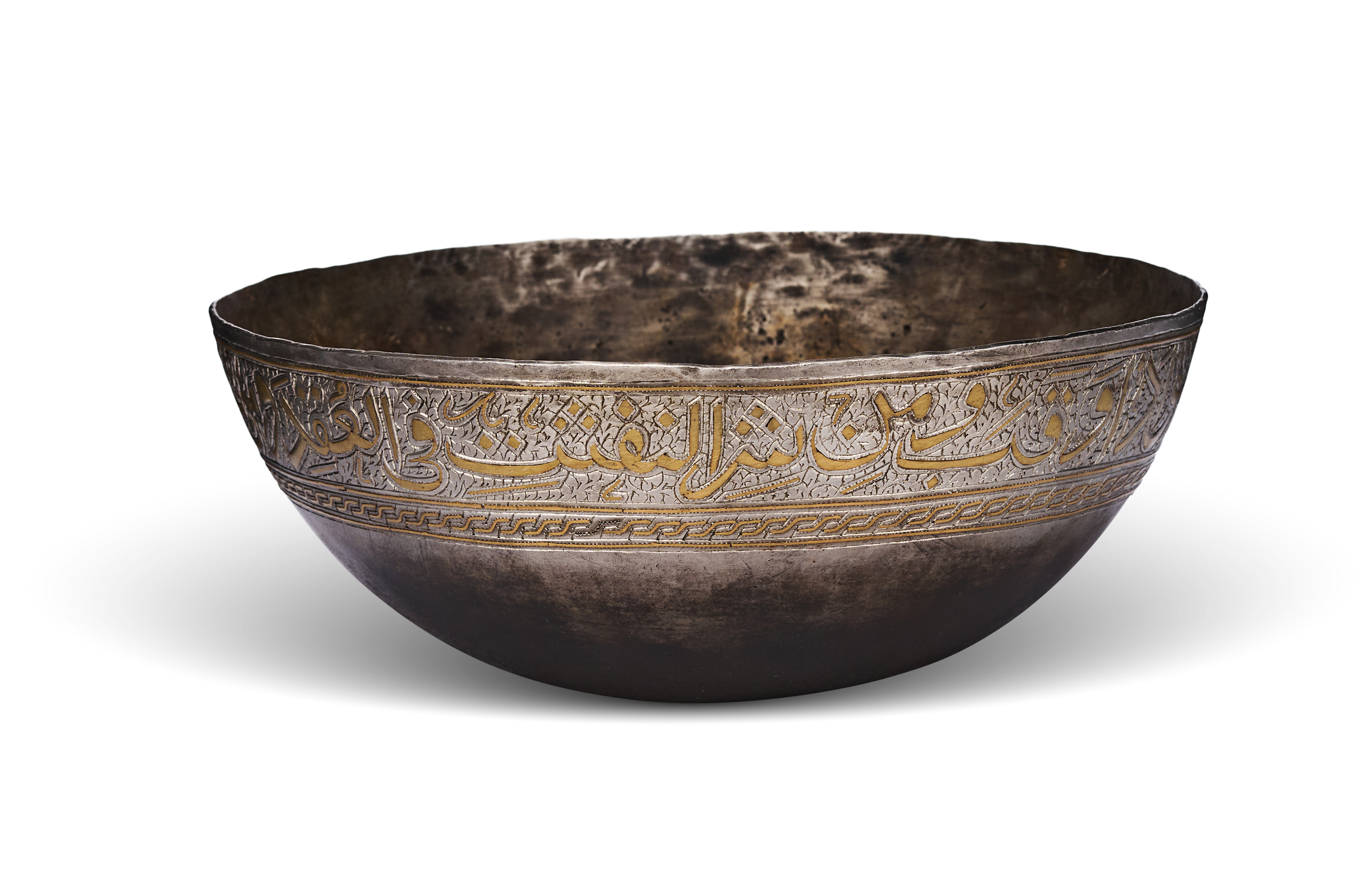 A PERSIAN GOLD AND SILVER-INLAID TALISMANIC METAL BOWL, 18TH OR 19TH CENTURY