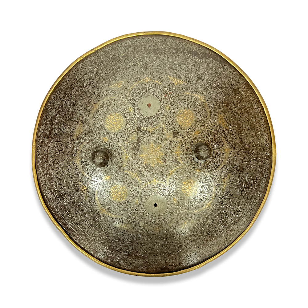 Lot 284: A QAJAR GOLD DAMASCENED STEEL SHIELD, PERSIA, 19TH CENTURY