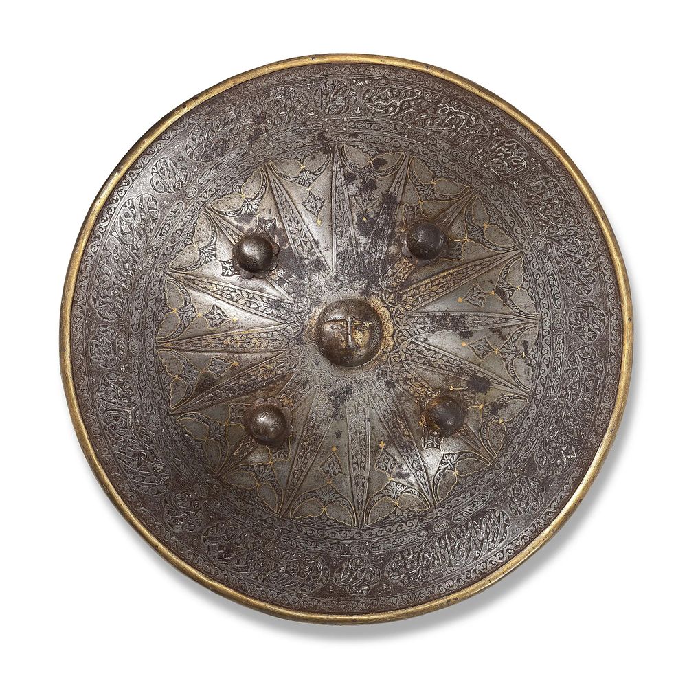 Lot 282: A QAJAR GOLD-DAMASCENED STEEL SHIELD (SIPAR) PERSIA, 19TH CENTURY