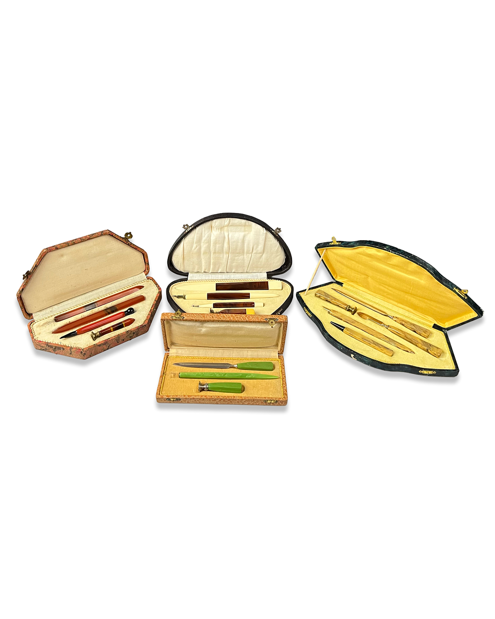 Lot 386: A COLLECTION OF ART DECO CASED CELLULOID DESK WRITING SETS WITH BAKELITE HANDLES