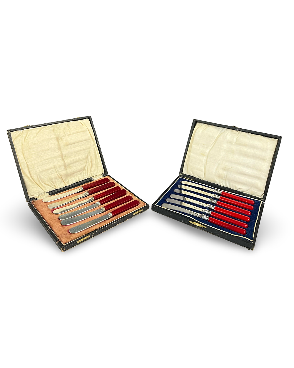 Lot 387: TWO CASED SETS OF ART DECO TEA KNIVES, PROBABLY CHERRY AMBER RED HANDLES